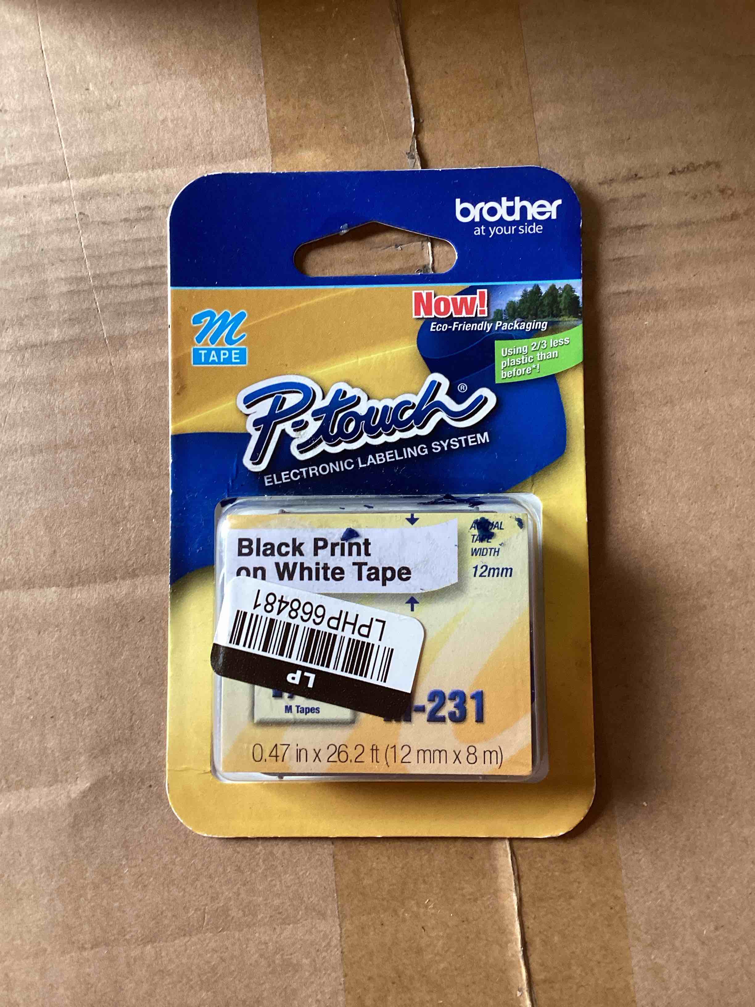 Condition photo showing New/Like New for brother 12mm (1/2 ) black on white non-laminated tape (8m/26.2 ) (1/pkg)