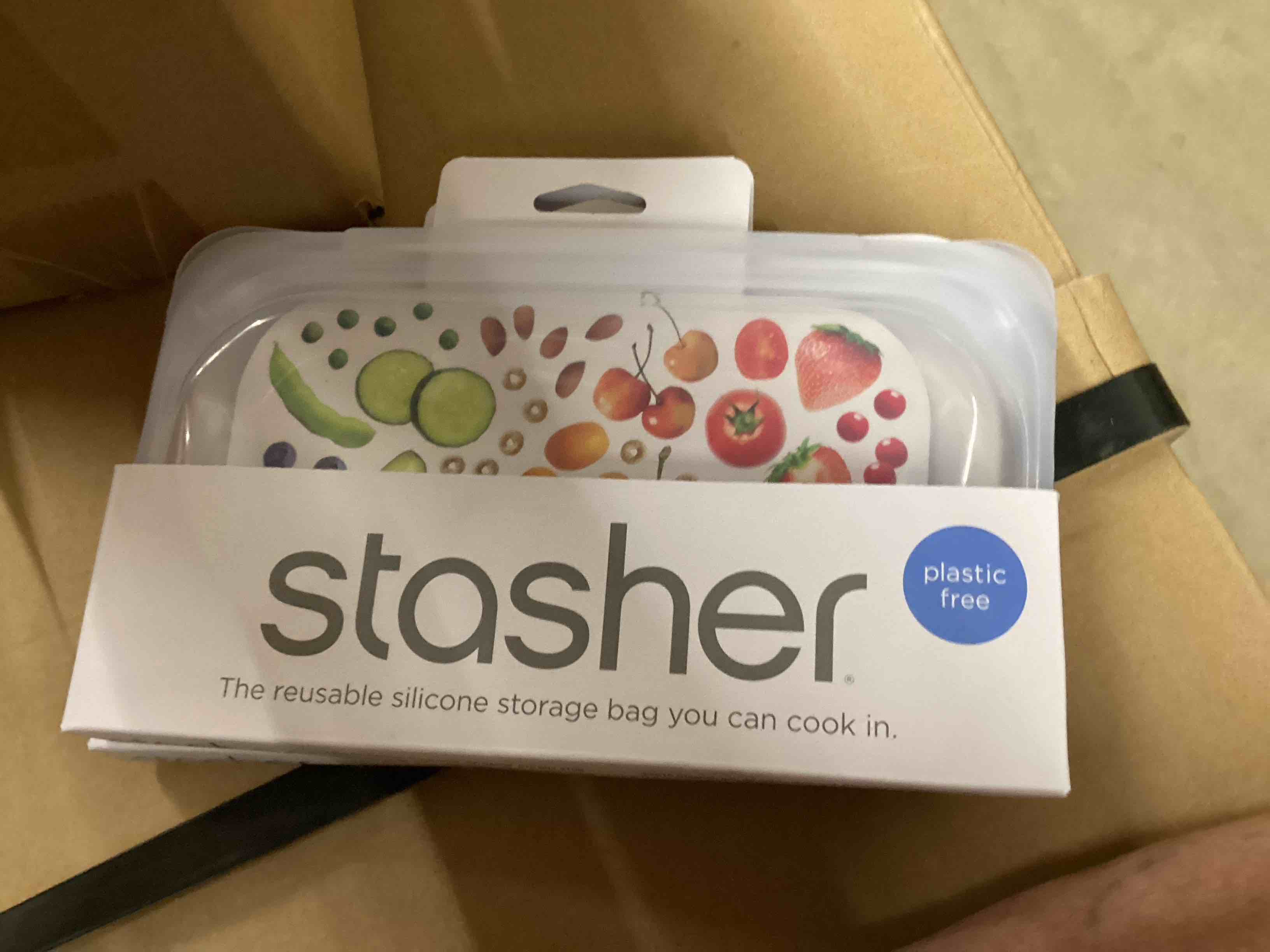 Condition photo showing New/Like New for stasher premium silicone reusable food storage snack bag, raspberry, microwave, sous vide, dishwasher, oven and freezer safe, bpa free, leak-free, eco-friendly, 12 oz