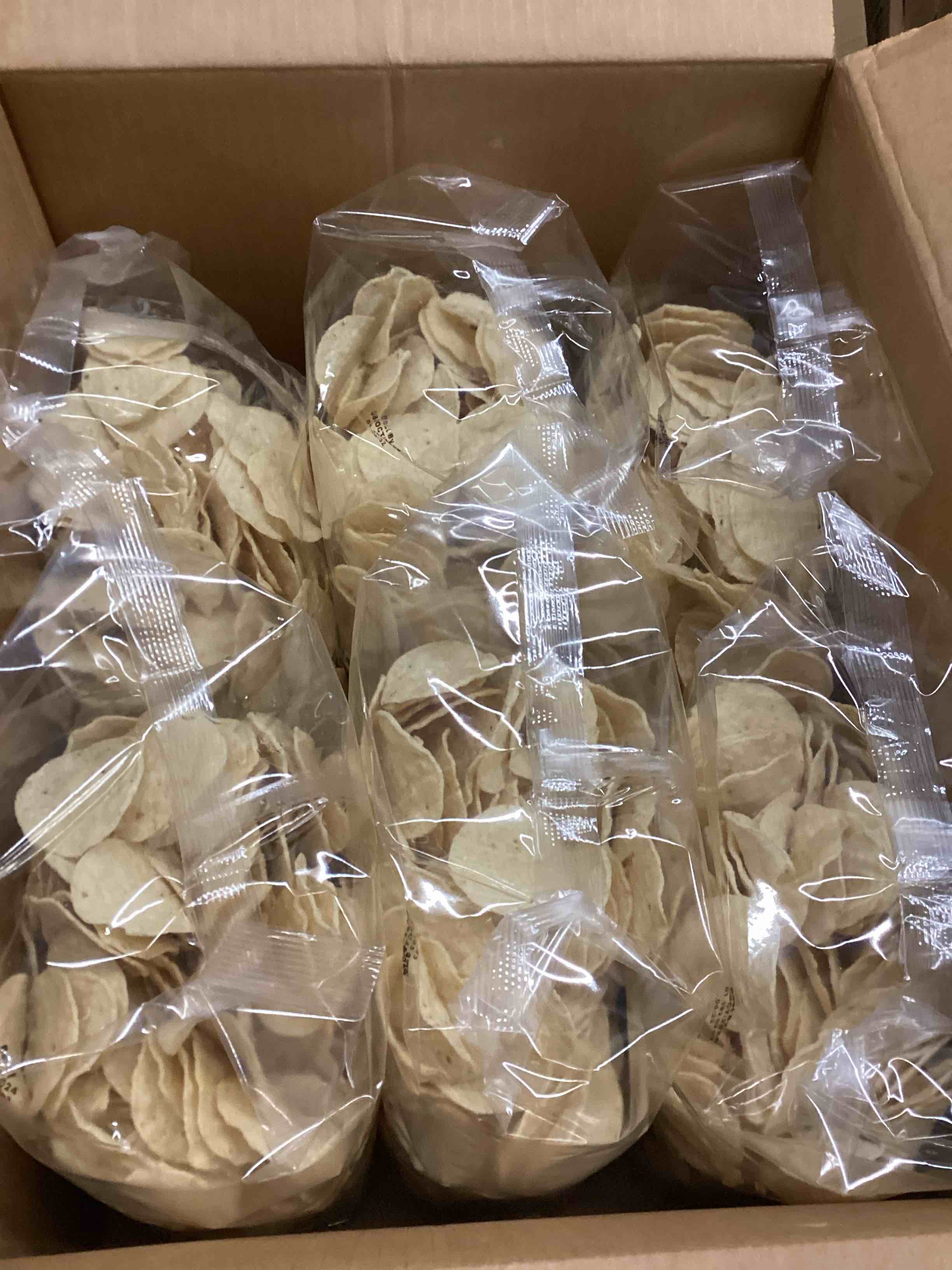 6- 2lp nacho chips , sell by october 8 of 2004