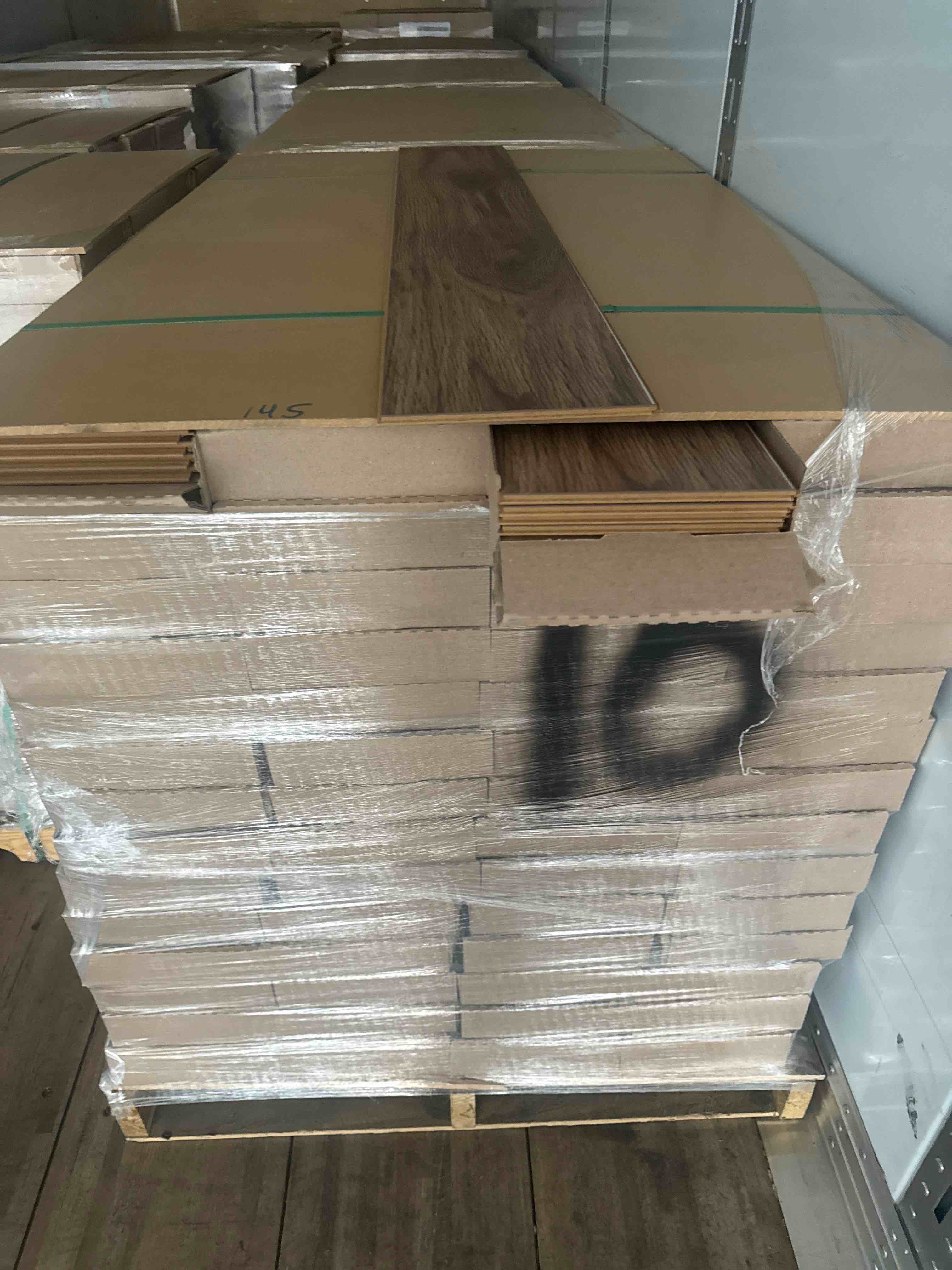 laminate wood flooring 10mm thickness 7.48 x 50.67 (15.80 sq ft/ box) 56 boxes = 884 sq ft _ bid per sq ft