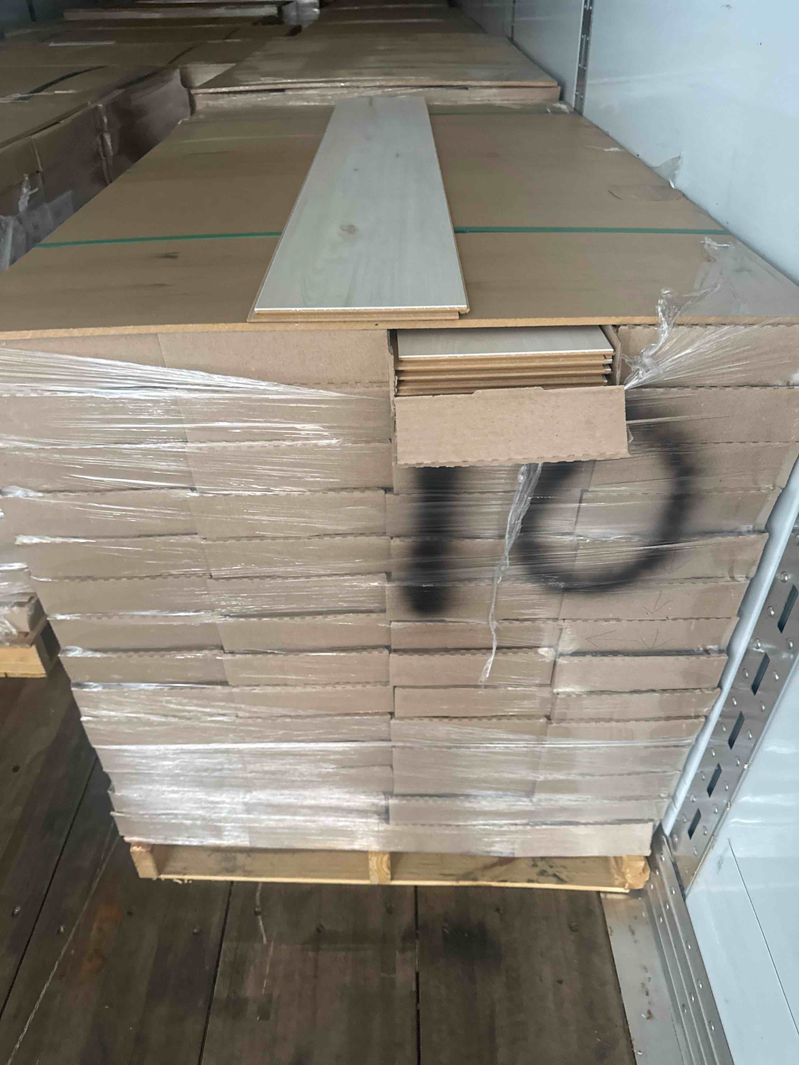 laminate wood flooring 10mm thickness 7.48 x 50.67 (15.80 sq ft/ box) 56 boxes = 884 sq ft _ bid per sq ft