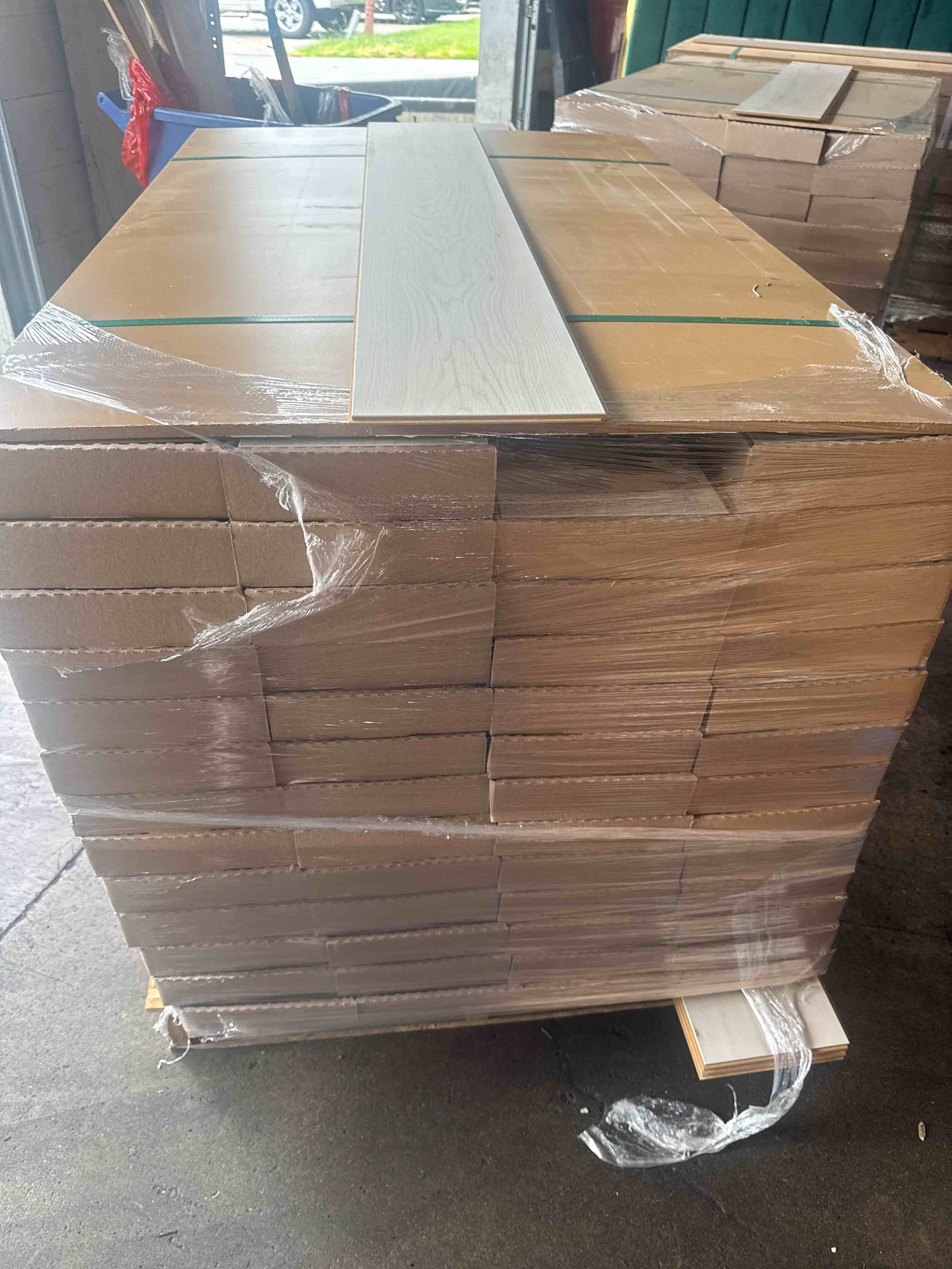 laminate wood flooring 10mm thickness 7.48 x 50.67 (15.80 sq ft/ box) 56 boxes = 884 sq ft _ bid per sq ft