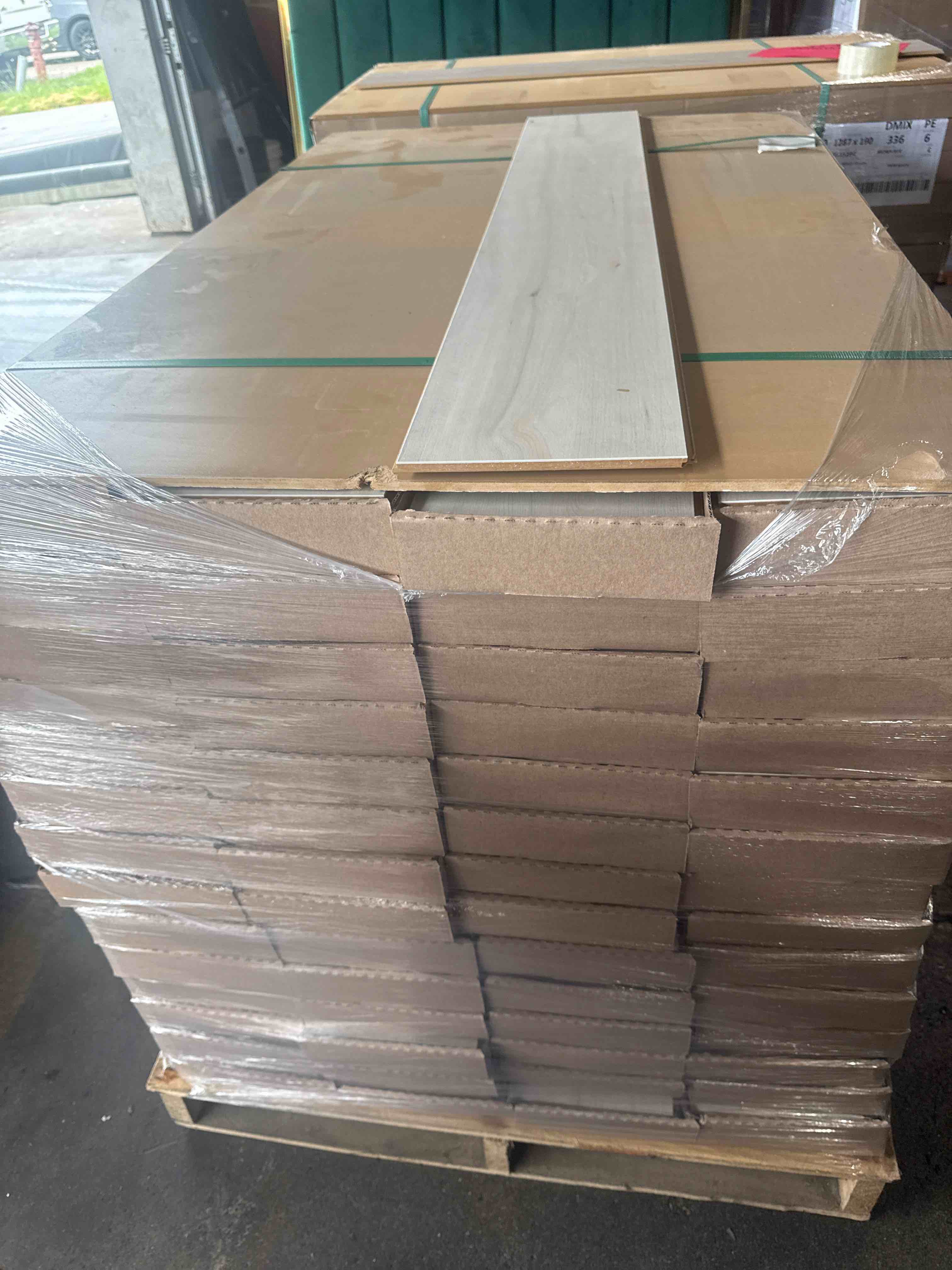 laminate wood flooring 10mm thickness 7.48 x 50.67 (15.80 sq ft/ box) 56 boxes = 884 sq ft _ bid per sq ft