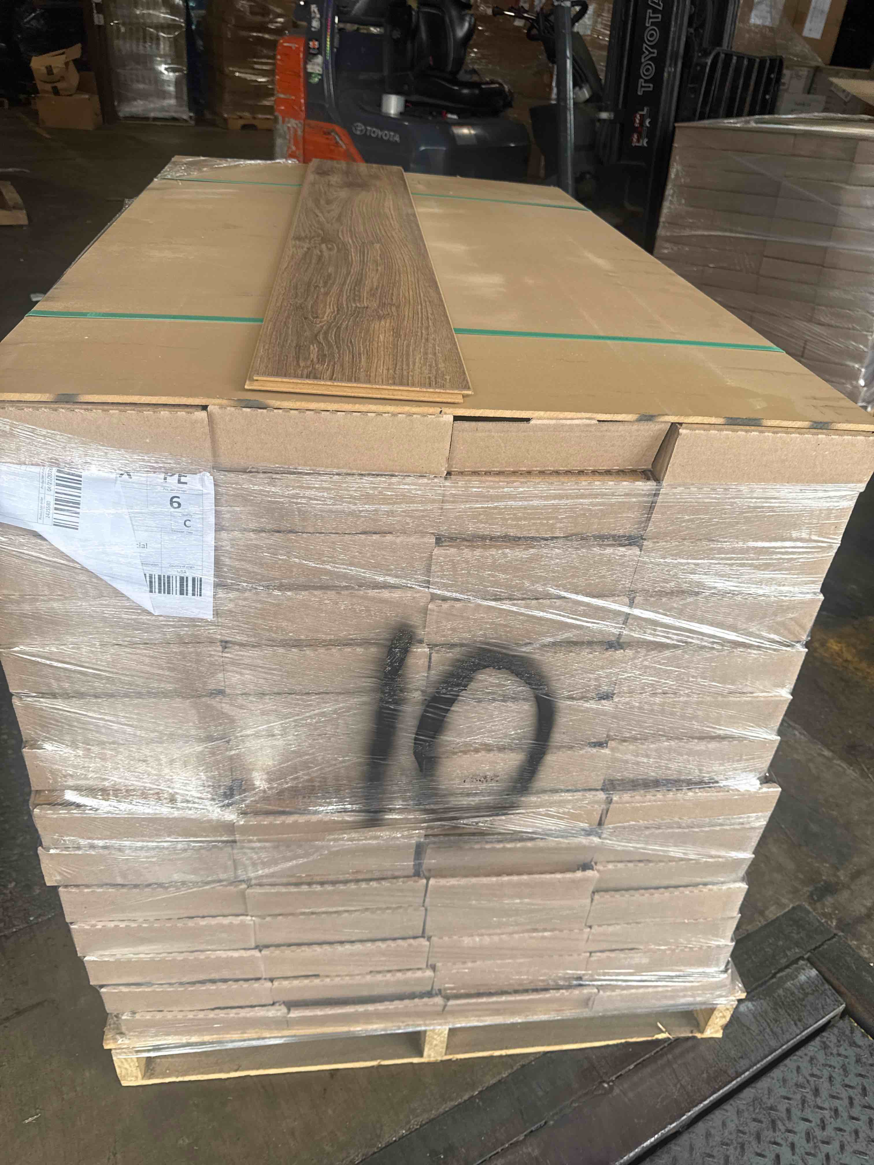 laminate wood flooring 10mm thickness 7.48 x 50.67 (15.80 sq ft/ box) 56 boxes = 884 sq ft _ bid per sq ft