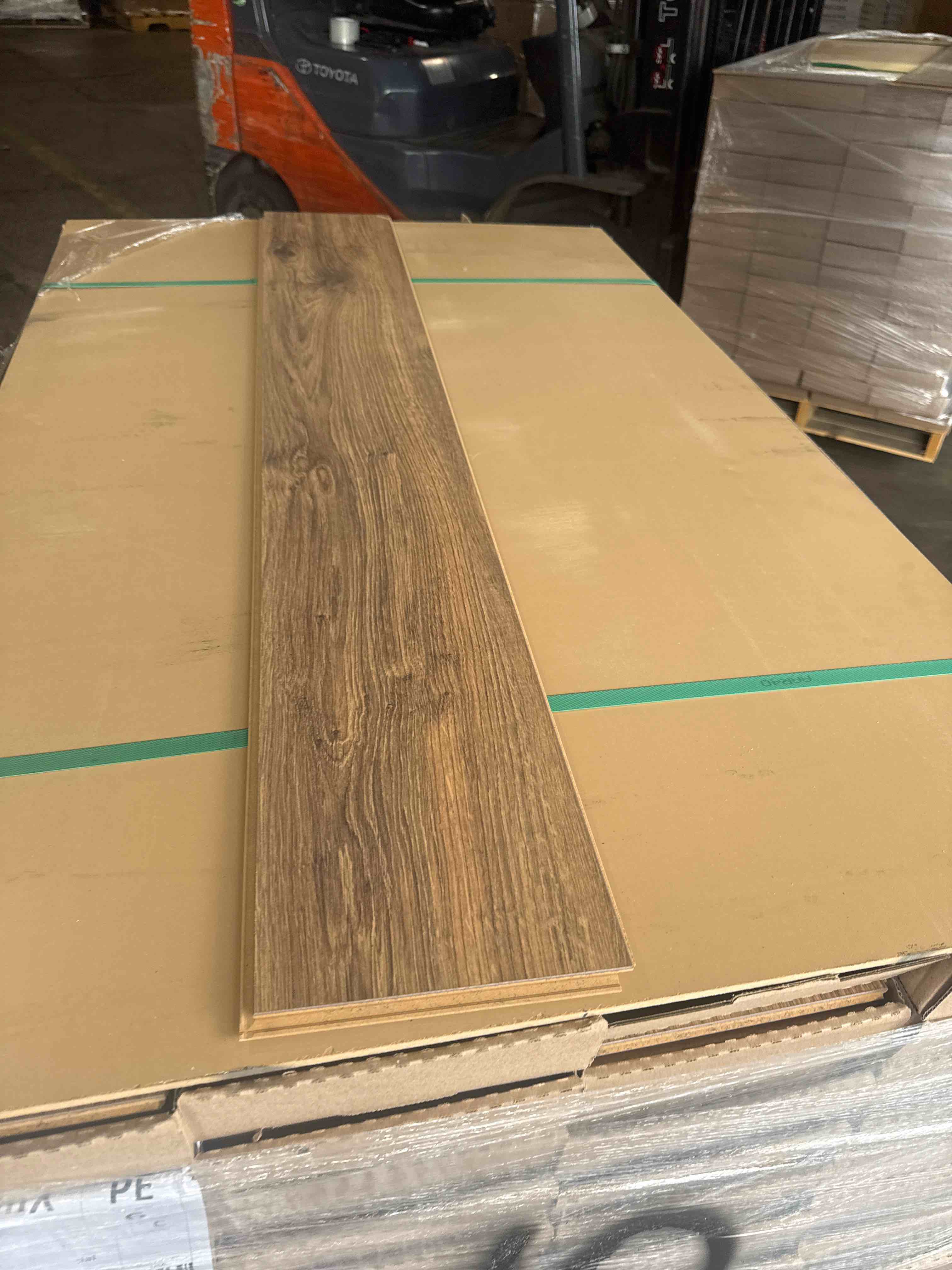 Condition photo showing Good Condition for laminate wood flooring 10mm thickness 7.48 x 50.67 (15.80 sq ft/ box) 56 boxes = 884 sq ft _ bid per sq ft