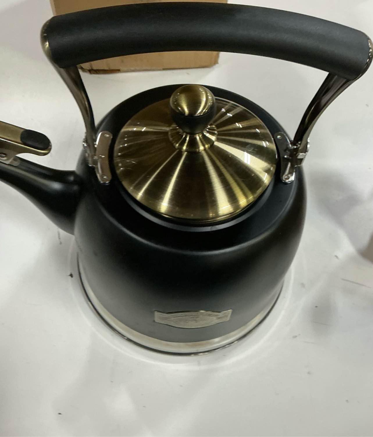 Condition photo showing As Is for susteas stove top whistling tea kettle - food grade stainless steel teakettle teapot with cool touch ergonomic handle, with 1 silicone pinch mitt included, 2.64 quart(black)