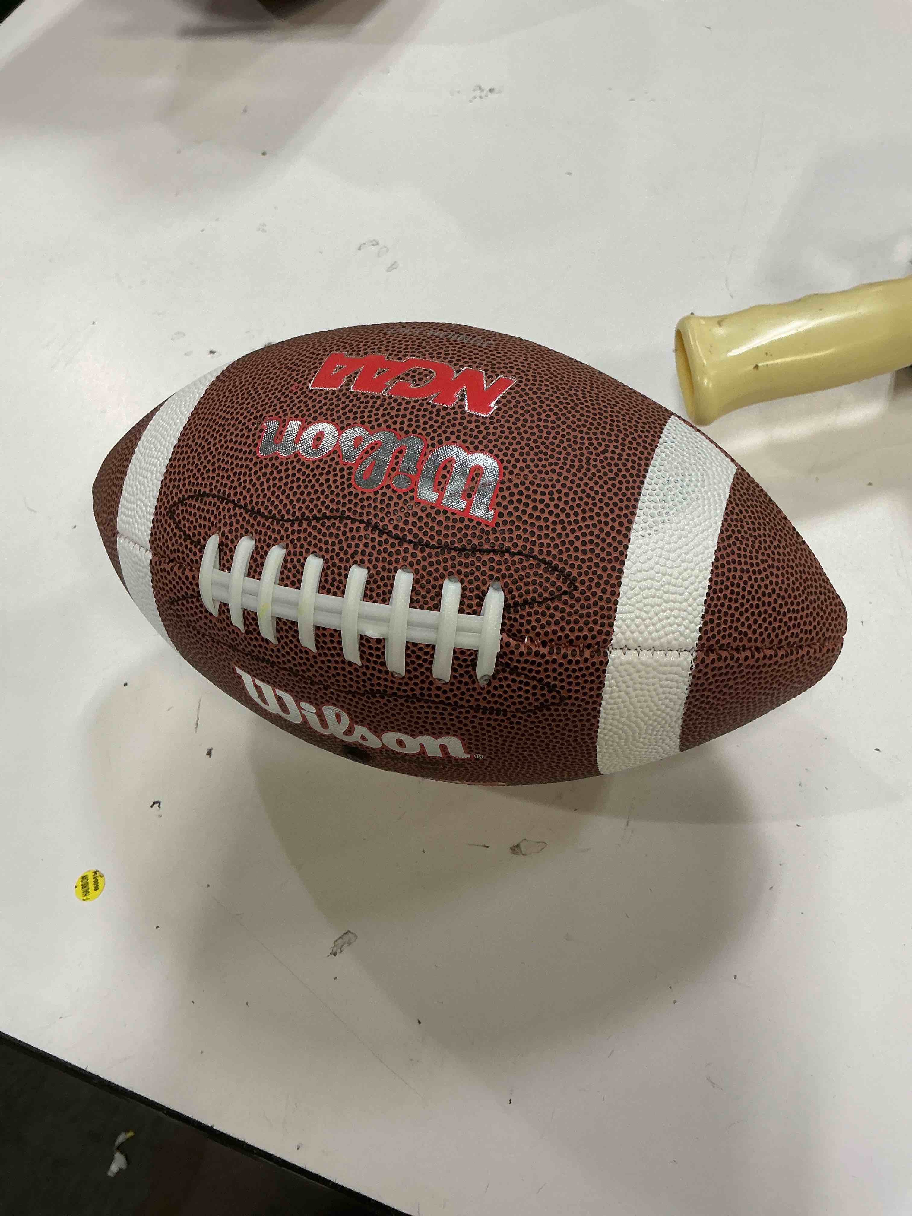 Condition photo showing Good Condition for wilson ncaa red zone composite football - brown, junior size (ages 9-12)