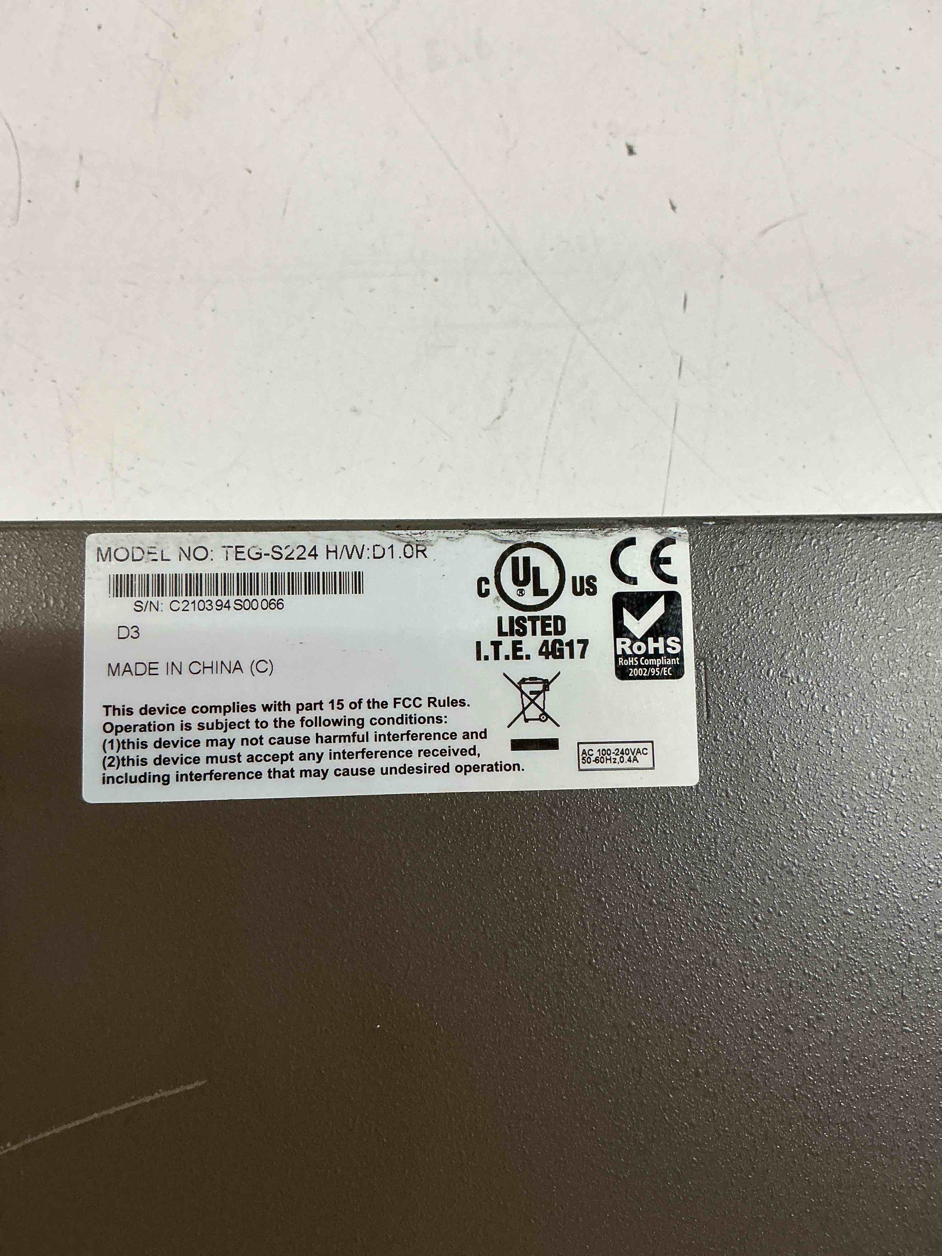 Condition photo showing As Is for trendnet teg-s224 24-port 10/100mbps switch with 2 gigabit ports for security systems