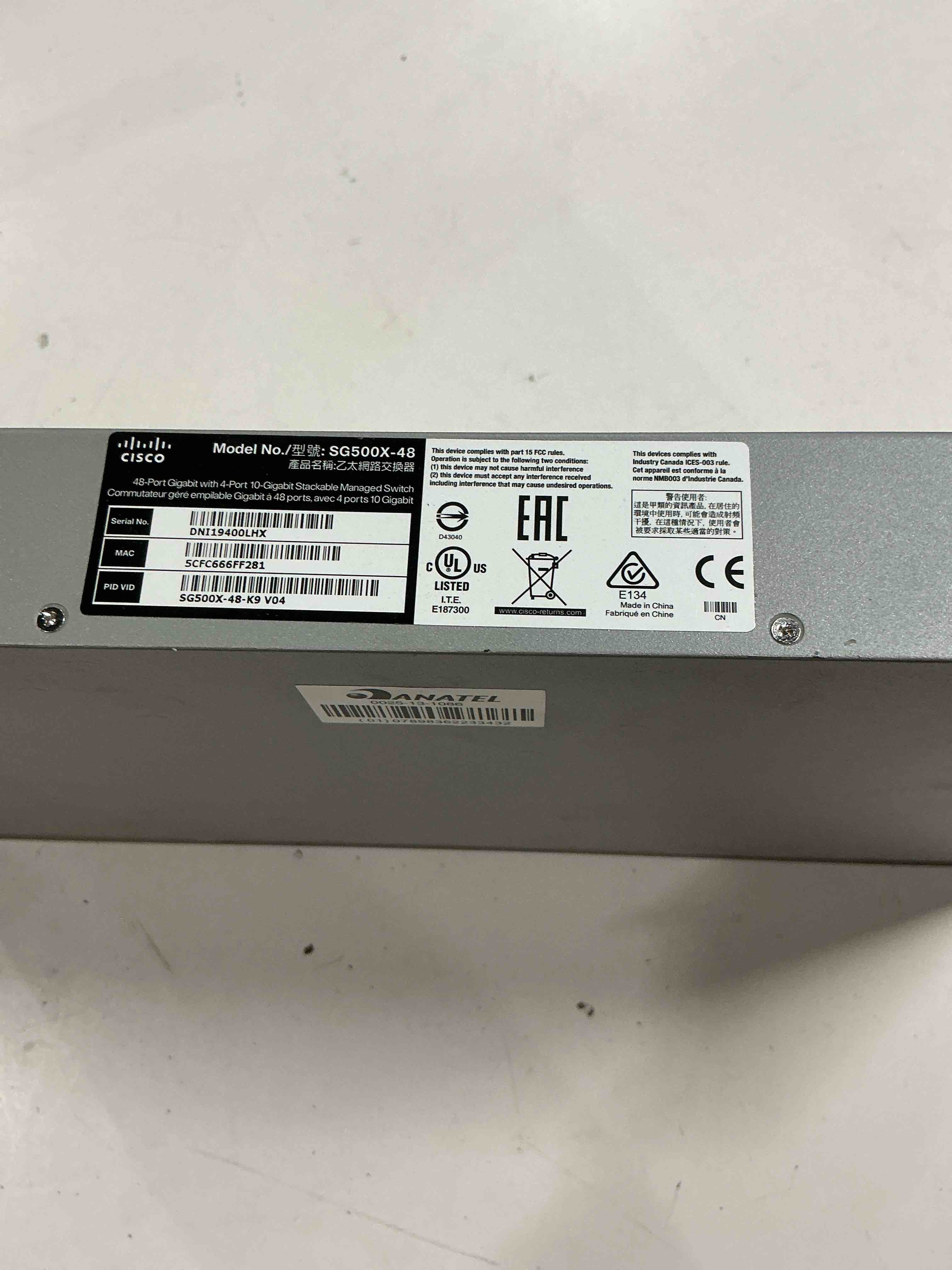 Condition photo showing As Is for cisco sg500x-48 layer 3 switch - 48 ports - manageable - 48 x rj-45 - stack port - 4 x expansion slots - 10/100/1000base-t - desktop, rack-mountable - sg500x-48-k9-na