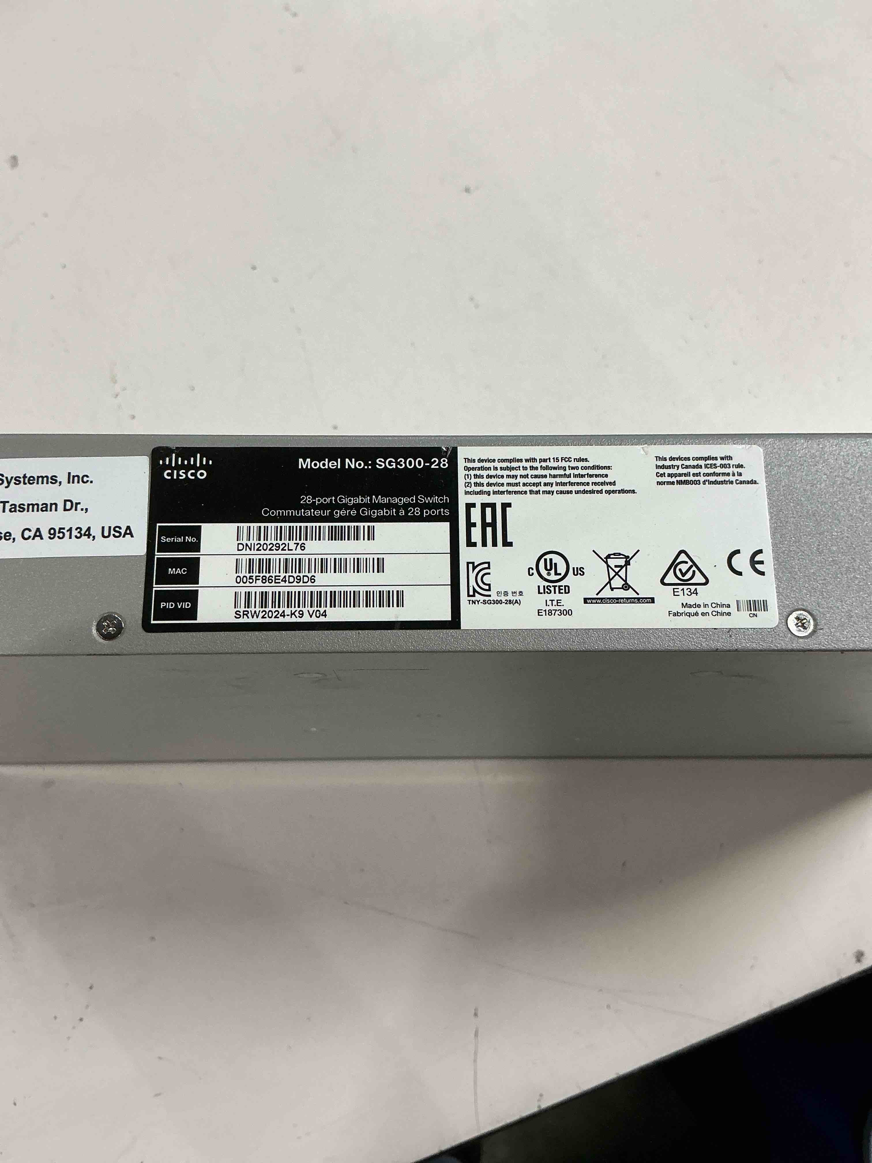 Condition photo showing As Is for cisco small business sg300-28 switch