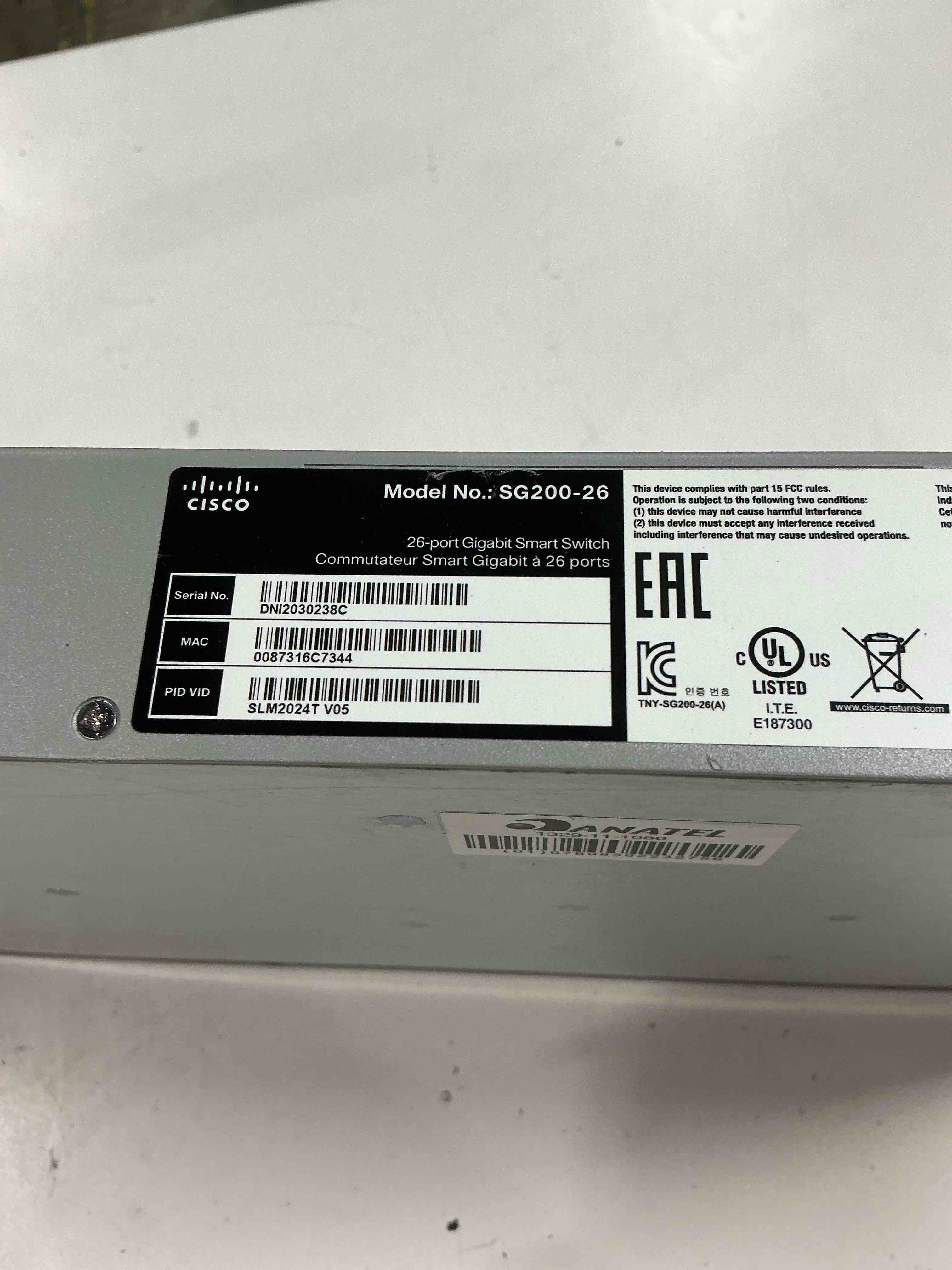 Condition photo showing As Is for cisco designed sg200-26 gigabit ethernet smart switch with 24 10/100/1000 ports and 2 combo mini-gbic ports (slm2024t-na), one size