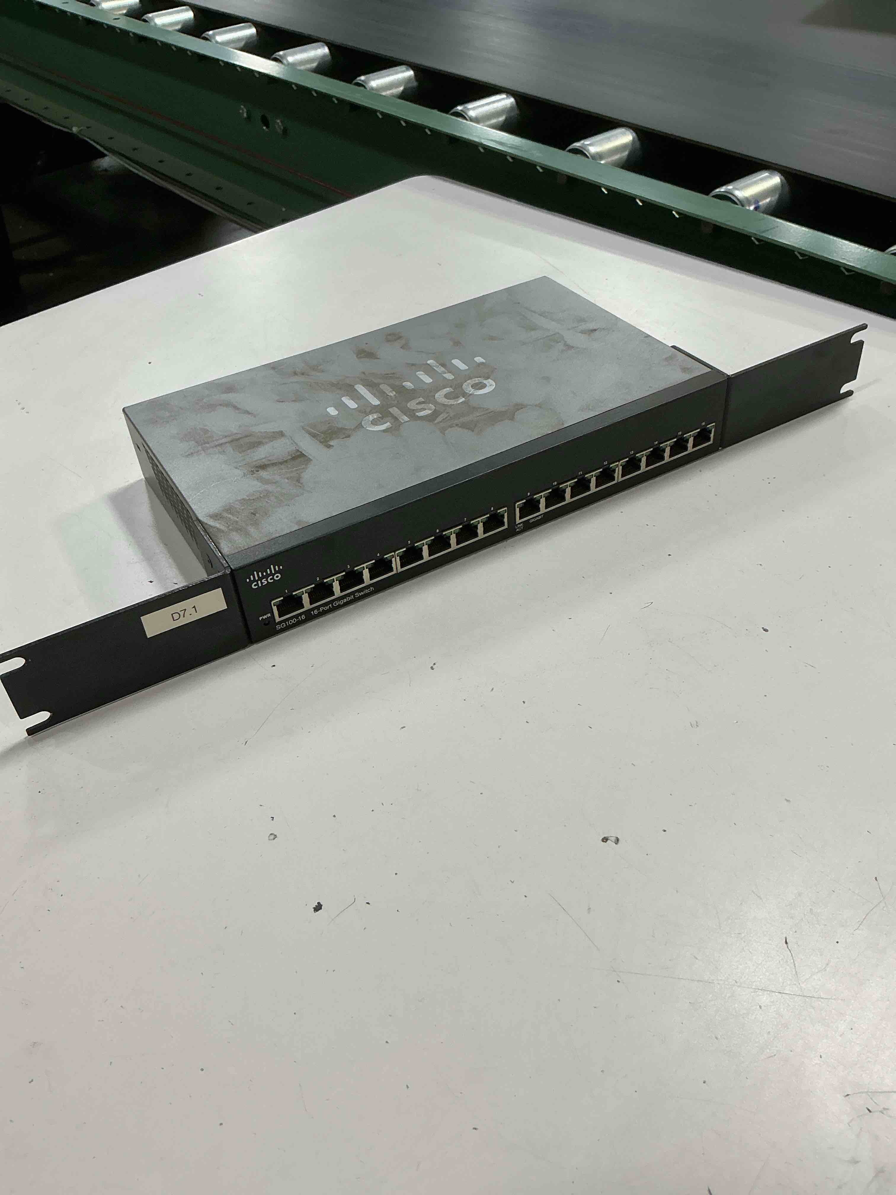 Condition photo showing As Is for cisco sg100-16 small business sg100-16 v2 unmanaged switch