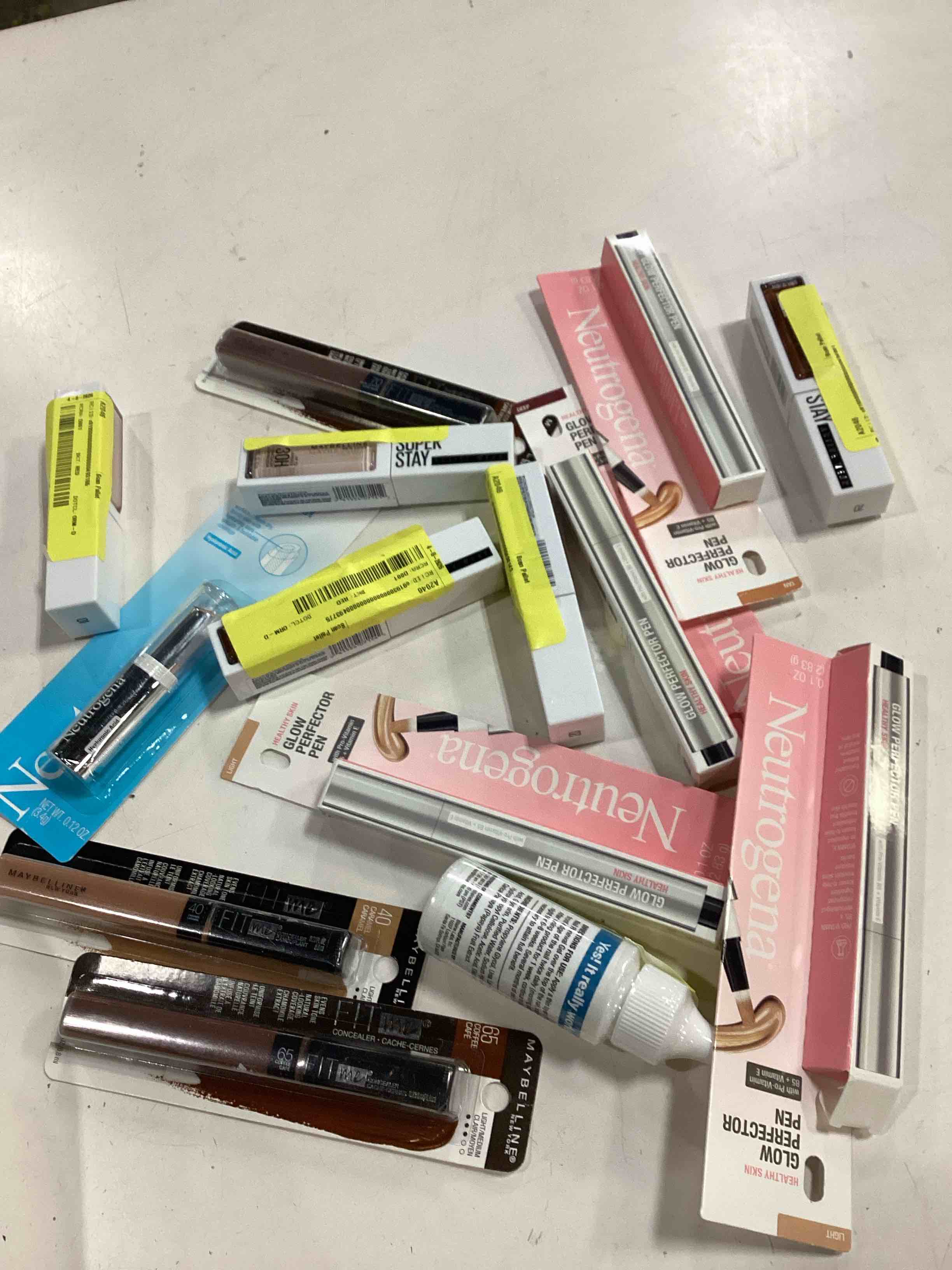Condition photo showing As Is for pack of 12 units makeup assorted cosmetics ( different styles, colors and brands) 
