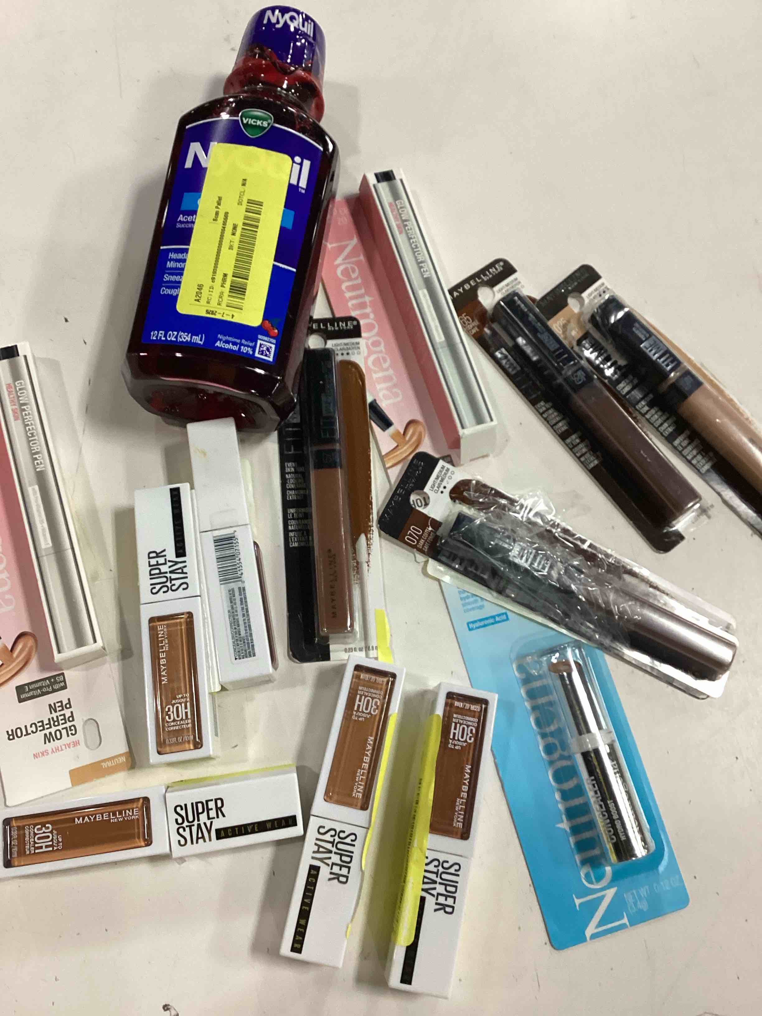 Condition photo showing As Is for pack of 12 units makeup assorted cosmetics ( different styles, colors and brands)