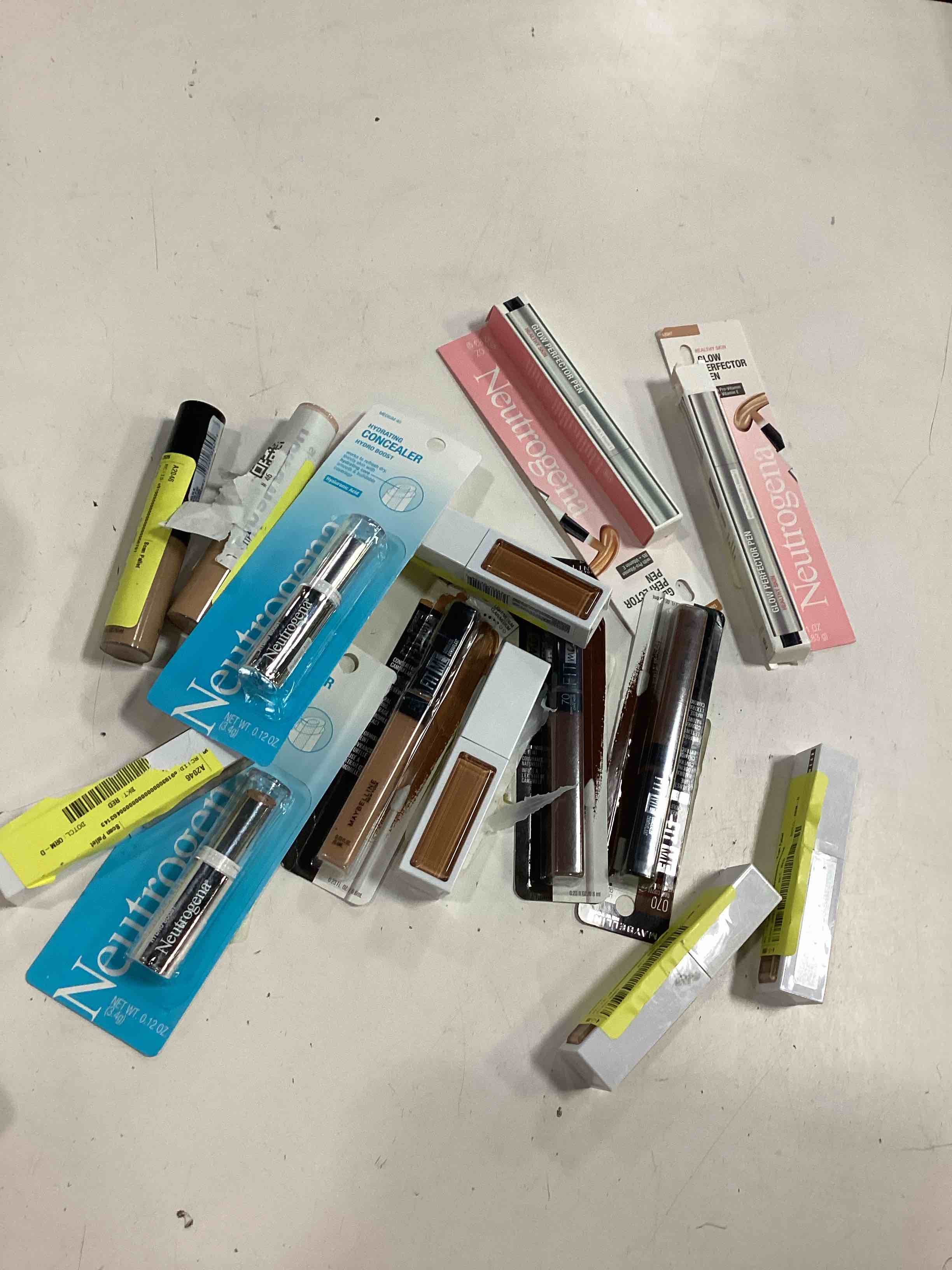 Condition photo showing As Is for pack of 12 units makeup assorted cosmetics ( different styles, colors and brands)