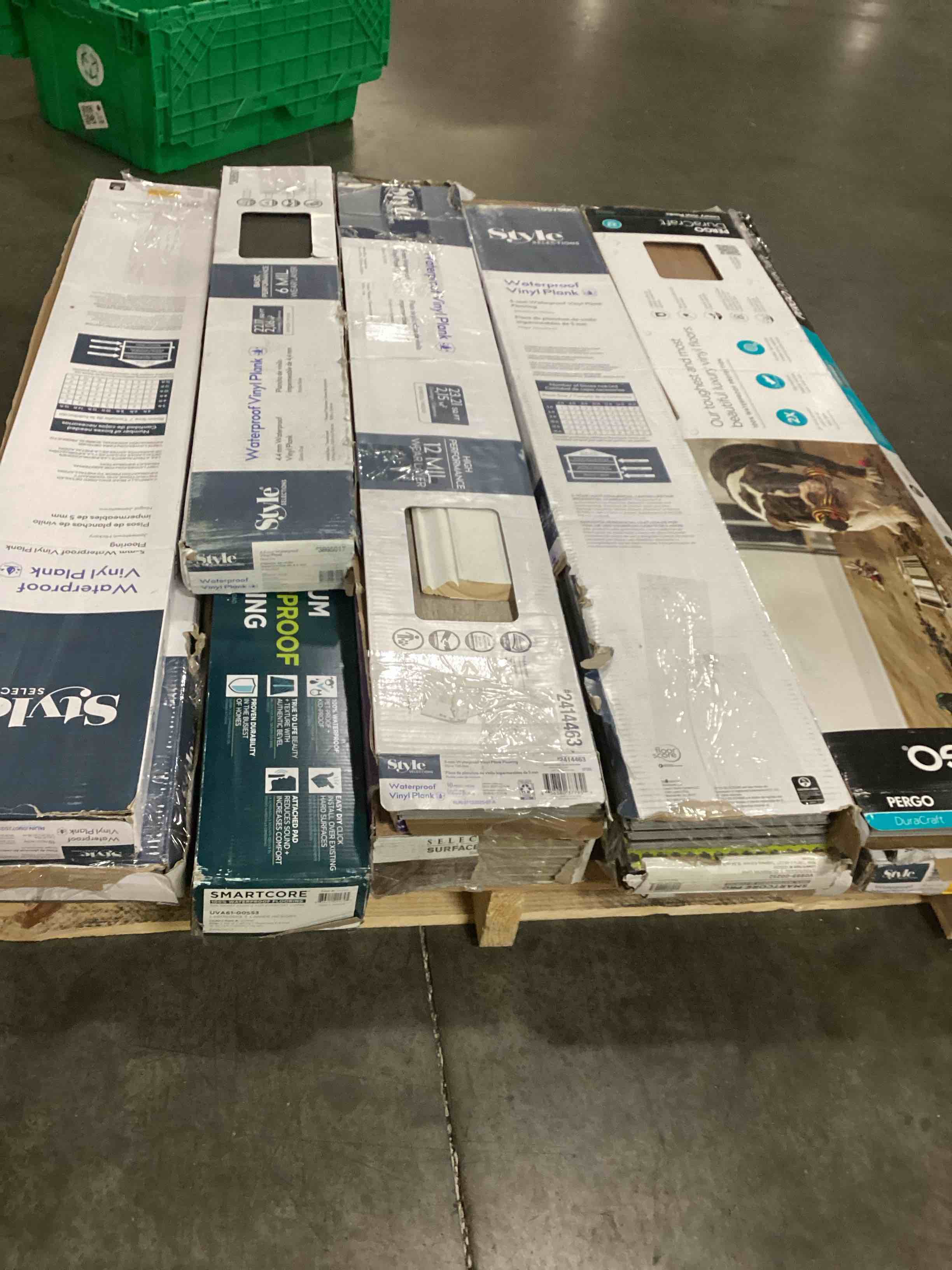 Condition photo showing As Is for assorted waterproof vinyl plank flooring (10 boxes) different size and style 