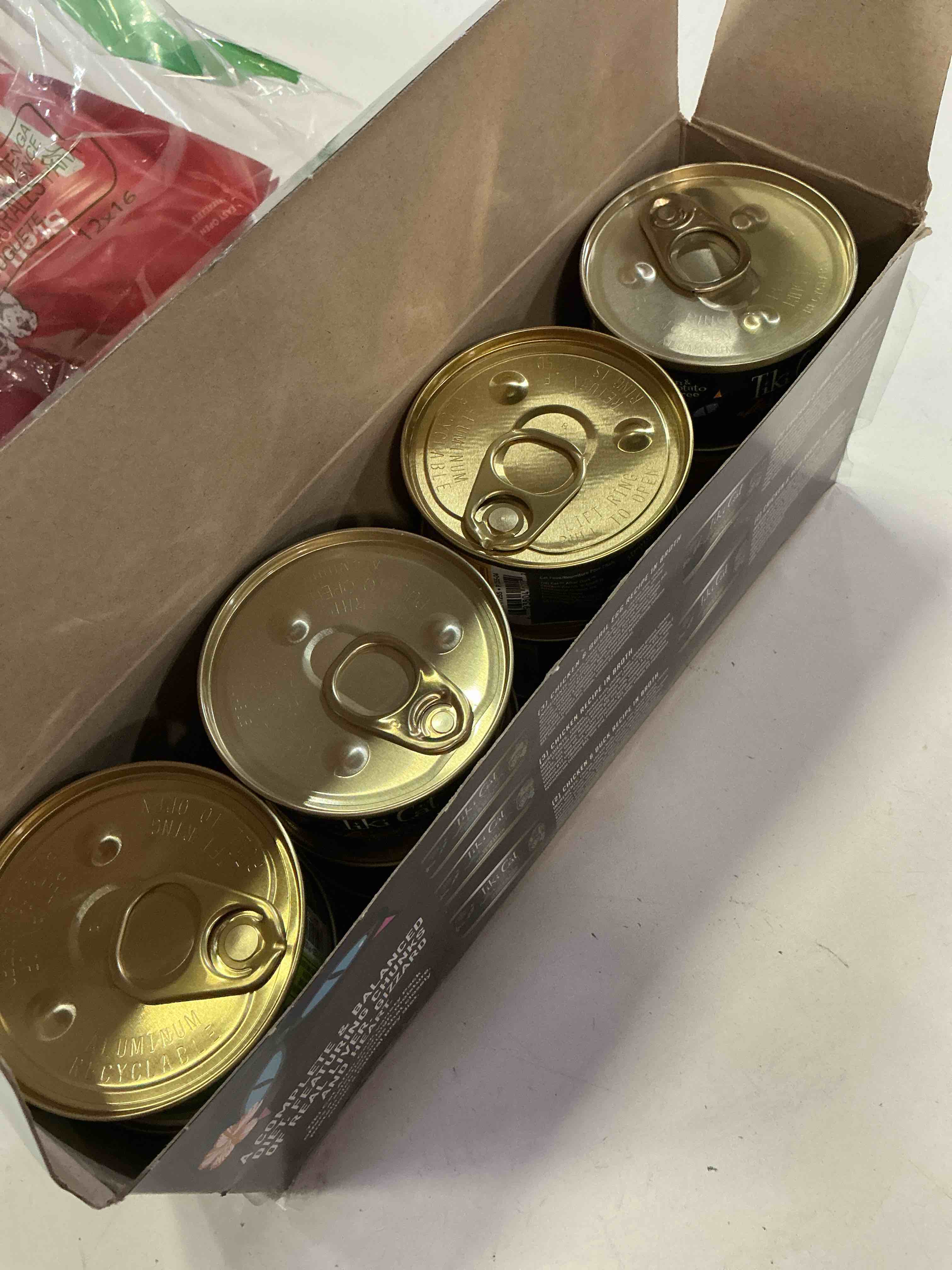 Condition photo showing New/Like New for (best by Jul/2028)Tiki Cat After Dark, Variety Pack, High-Protein and 100% Non-GMO Ingredients, Wet Cat Food for Adult Cats, 2.8 oz. Cans (Pack of 12) 2.8 Ounce (Pack of 12)