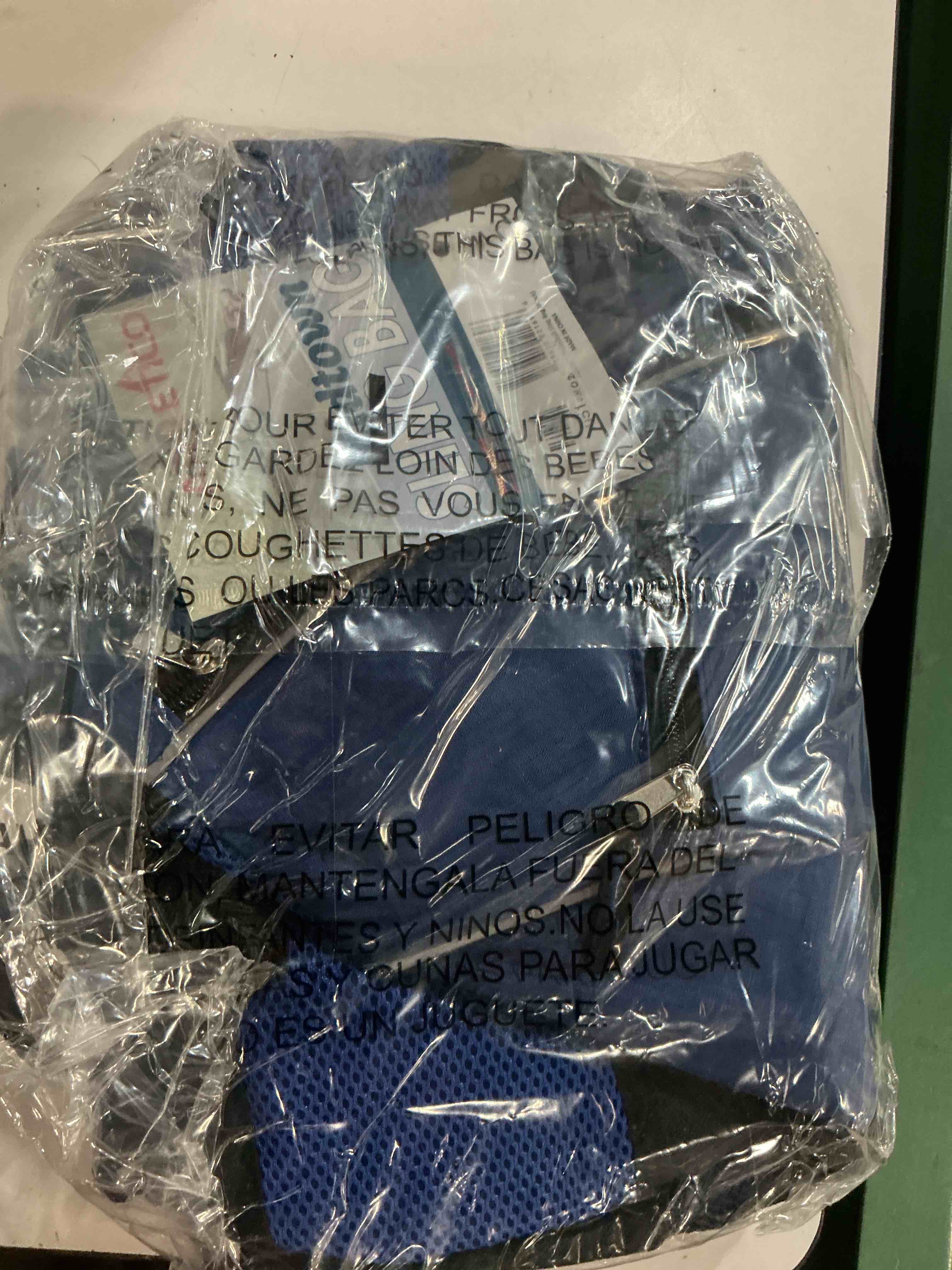 Condition photo showing Good Condition for athletico sling bag - crossbody backpack for pickleball, tennis, racketball, and travel for men and women color is blue and black 