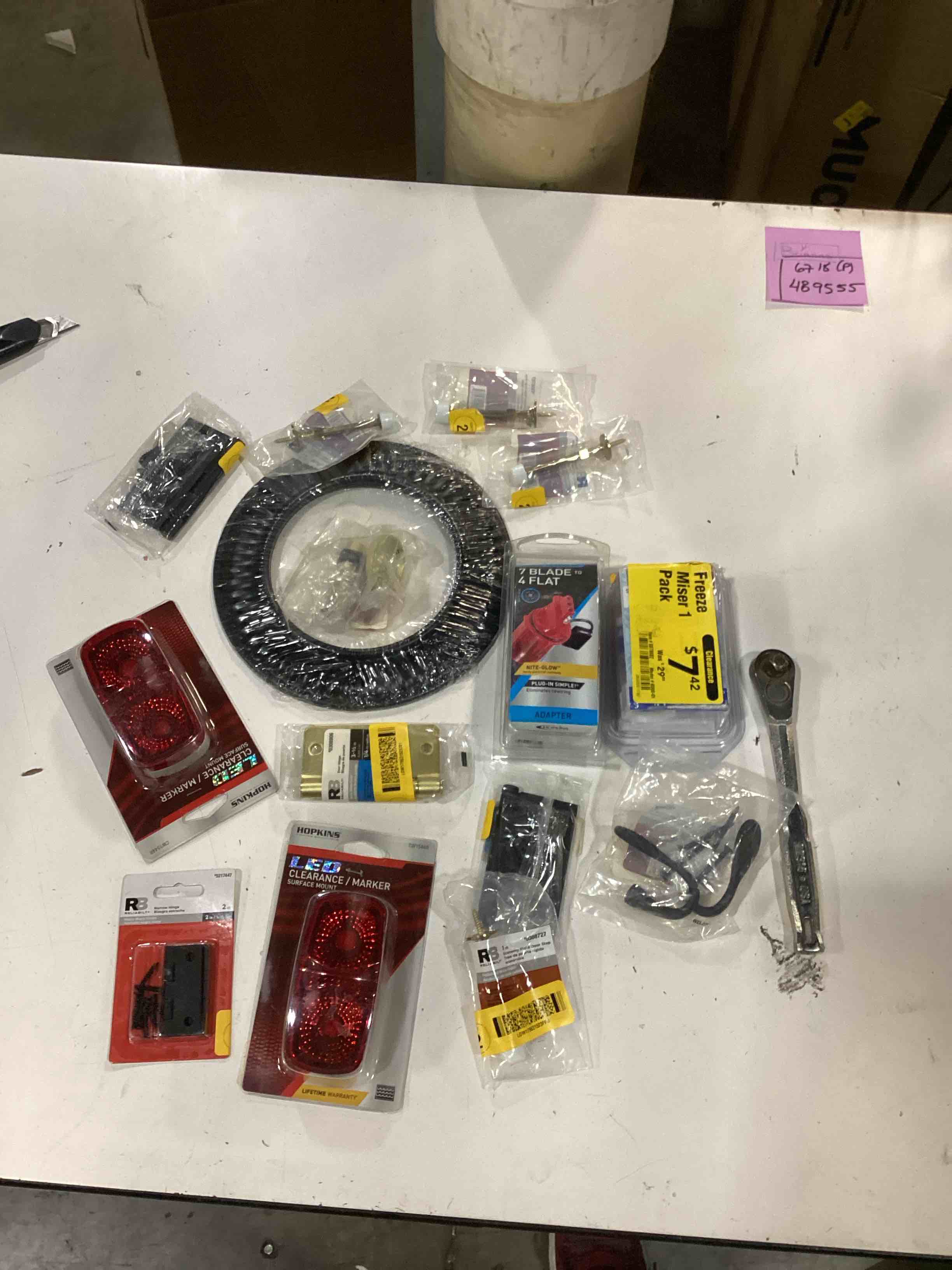Condition photo showing As Is for assorted home improvement lot (small tools, screw, home accessories, etc.)