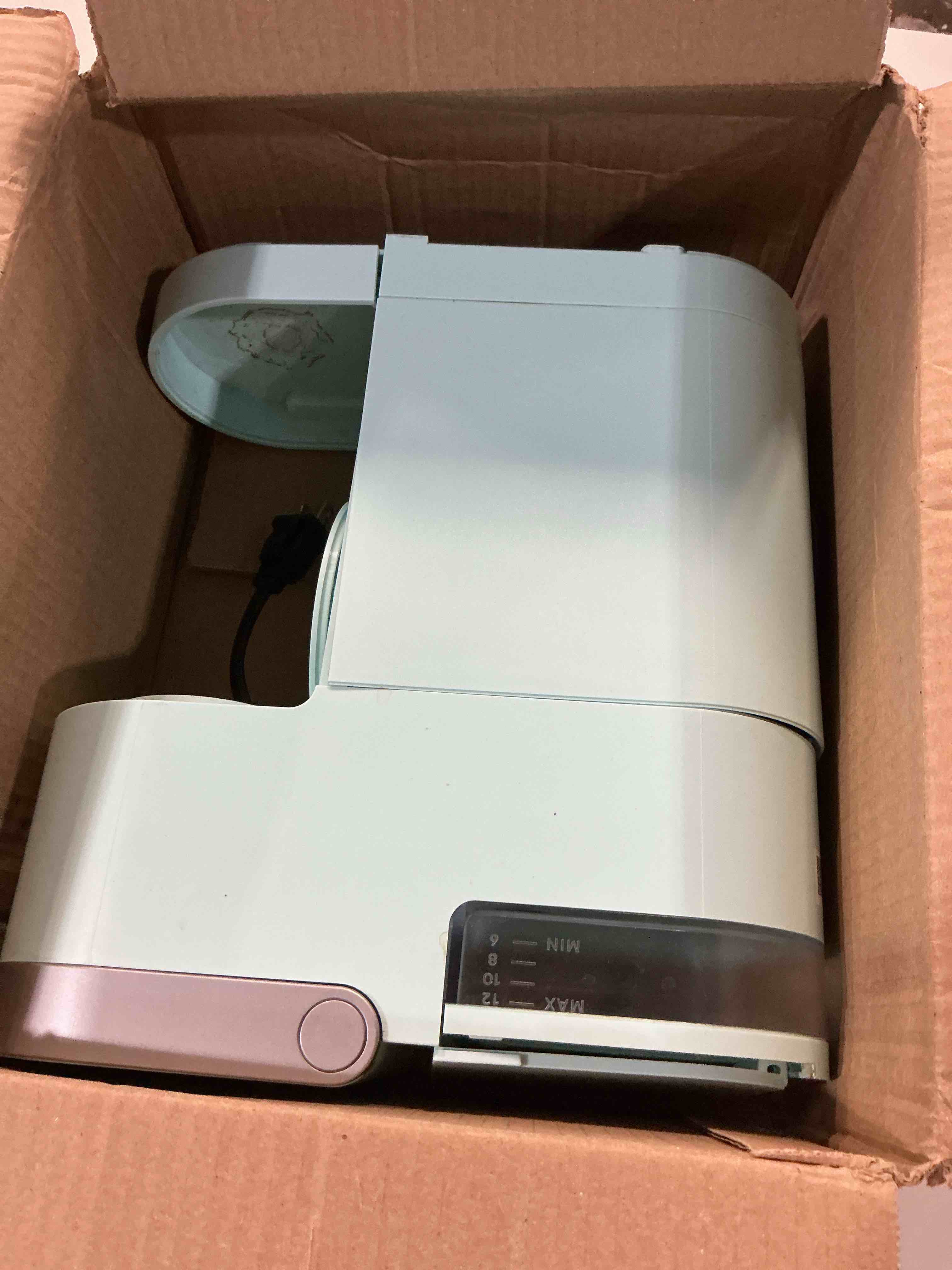 Condition photo showing As Is for keurig k-mini single serve coffee maker, oasis