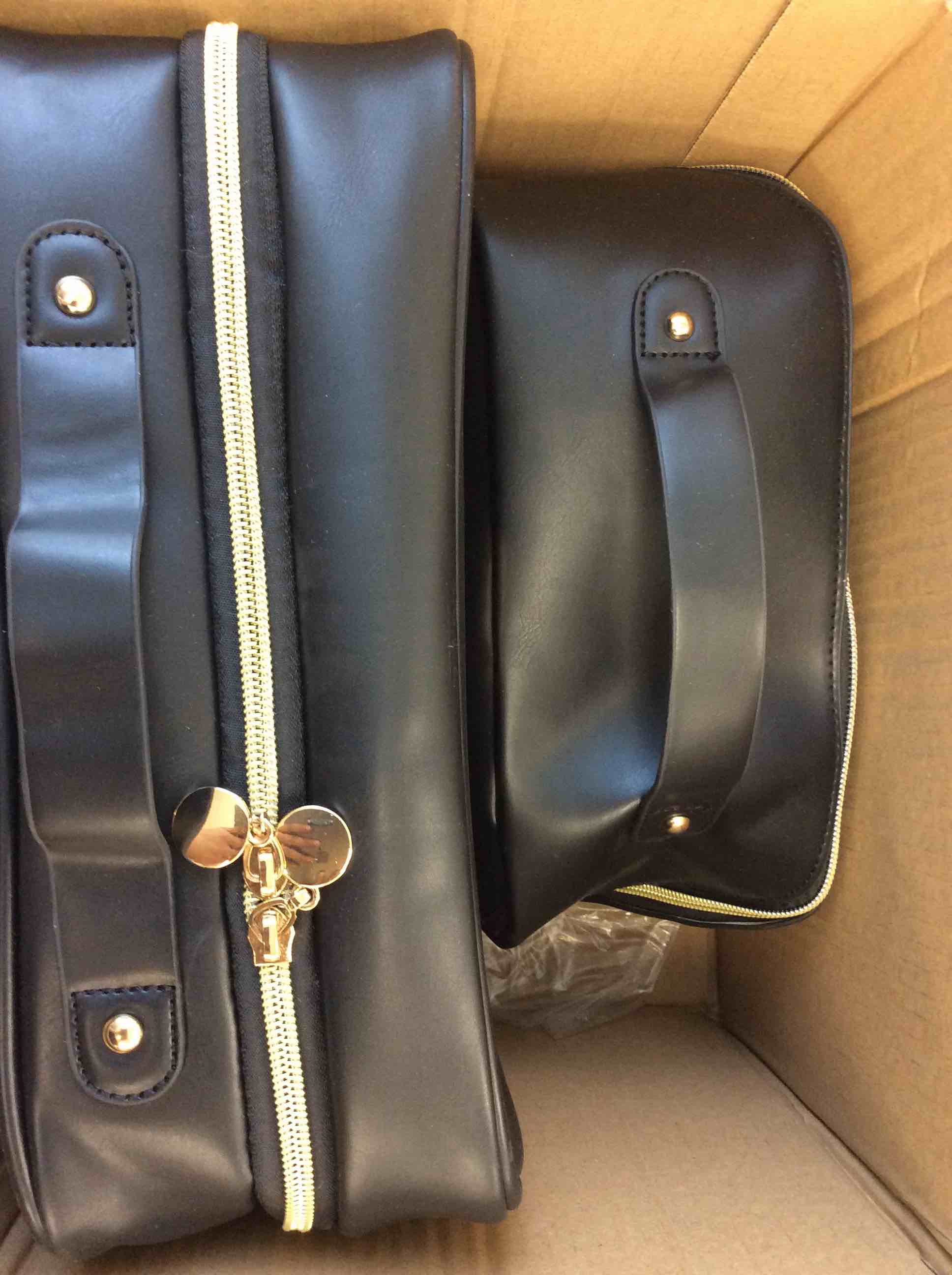 Condition photo showing New/Like New for improvement black makeup bags 