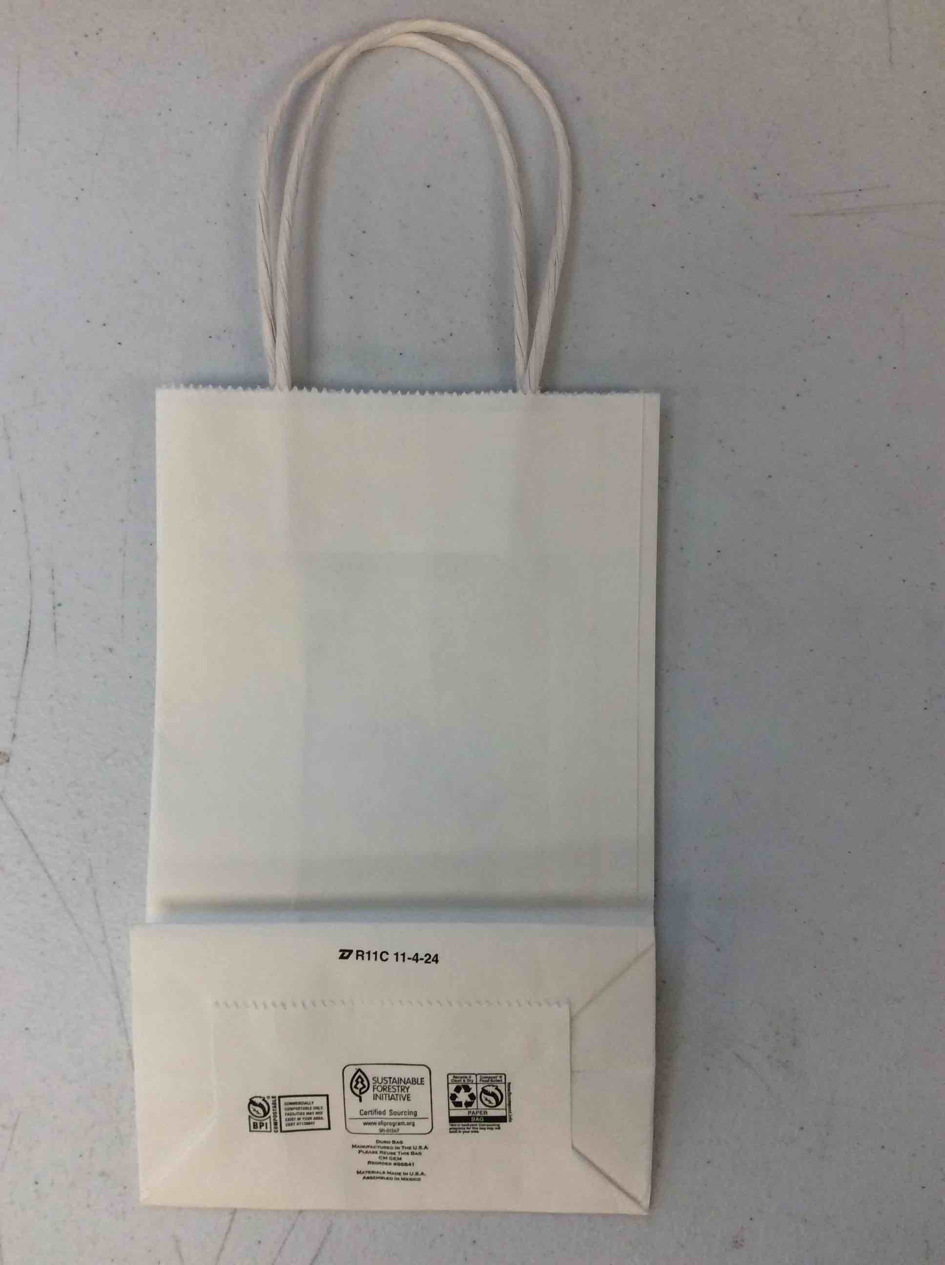 Condition photo showing New/Like New for box of white bags 