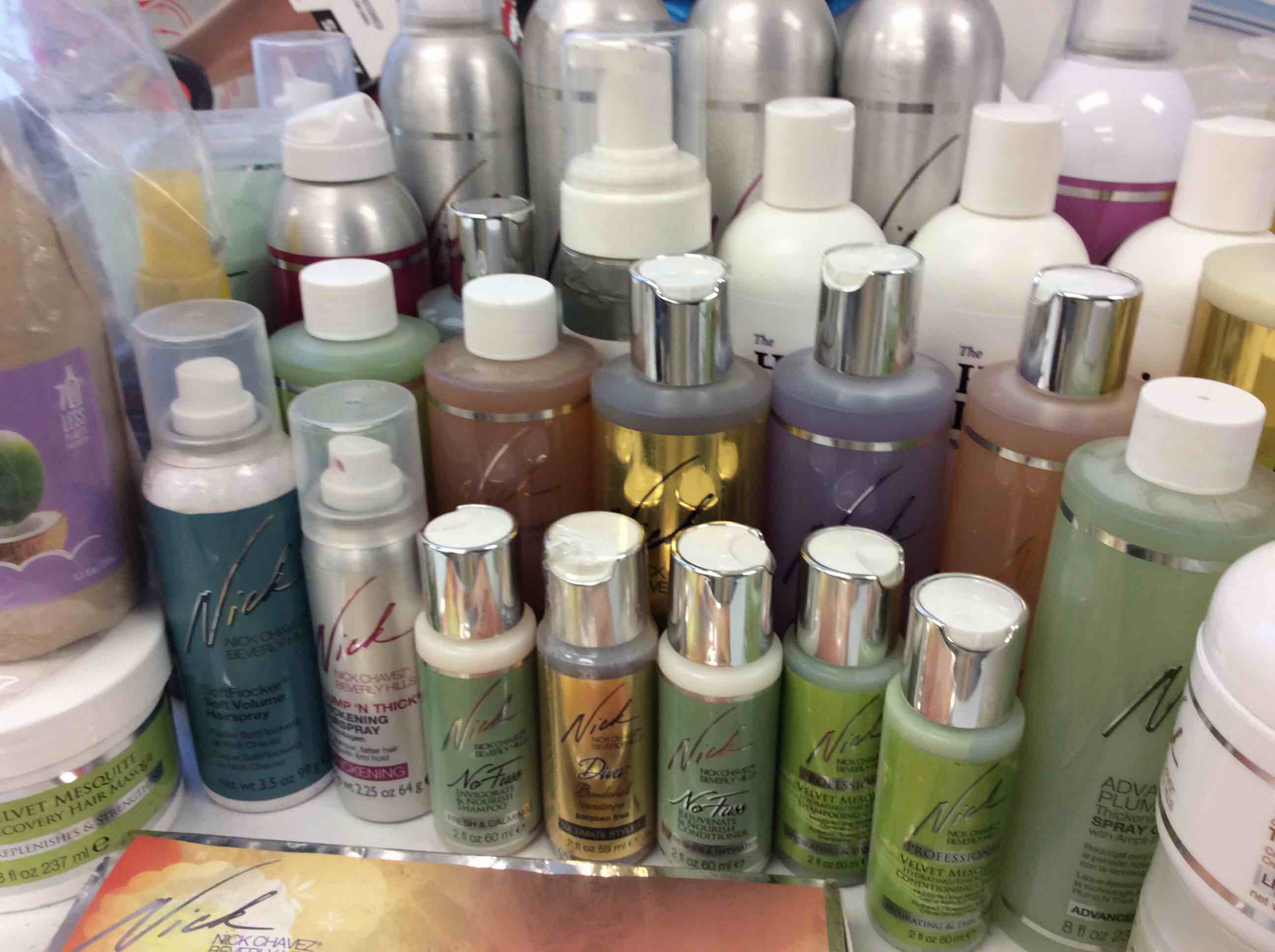 Condition photo showing New/Like New for box of nicks hair spray, shampoo, conditioner, and creams