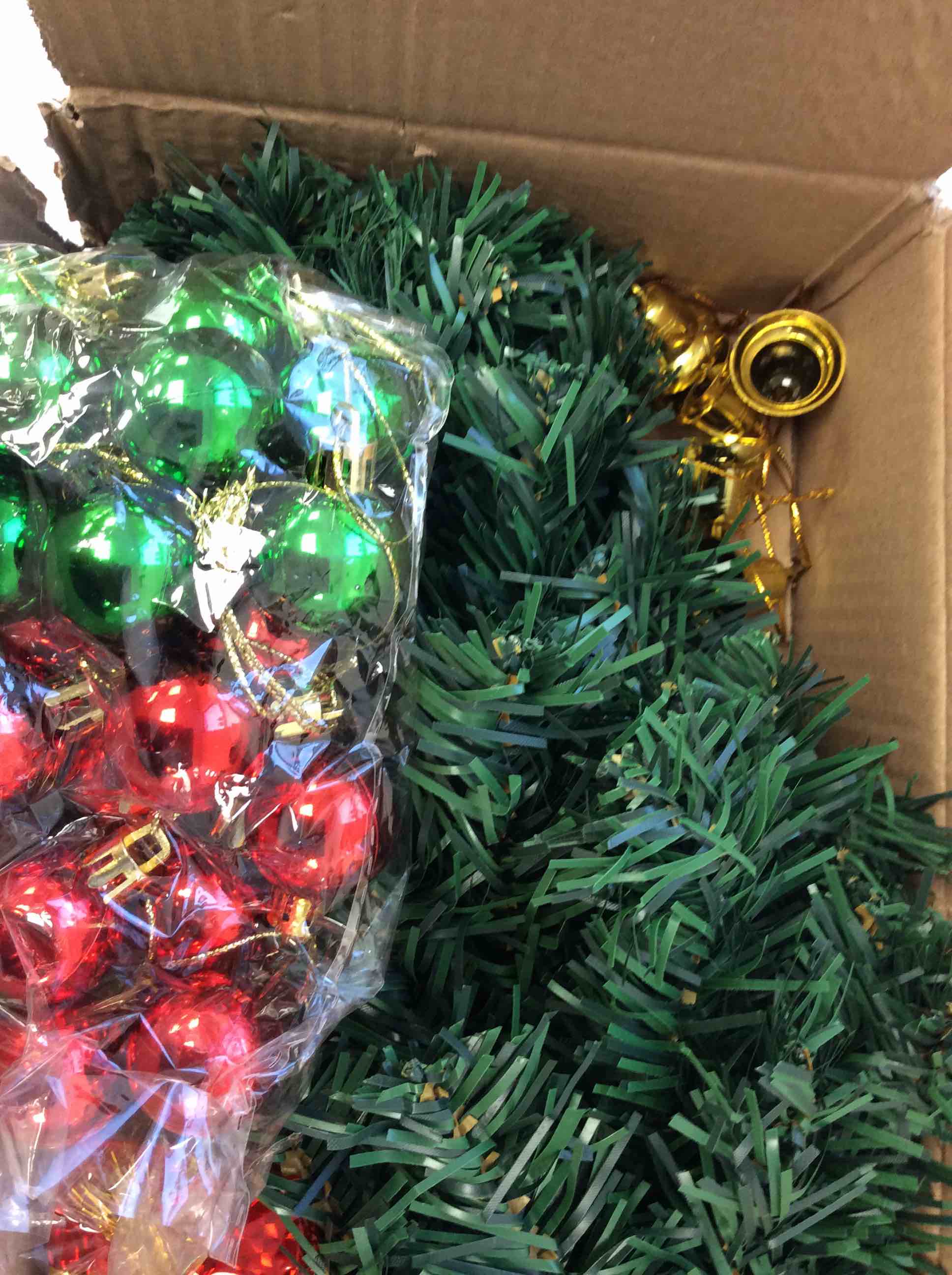 Condition photo showing New/Like New for mini christmas tree with decor 