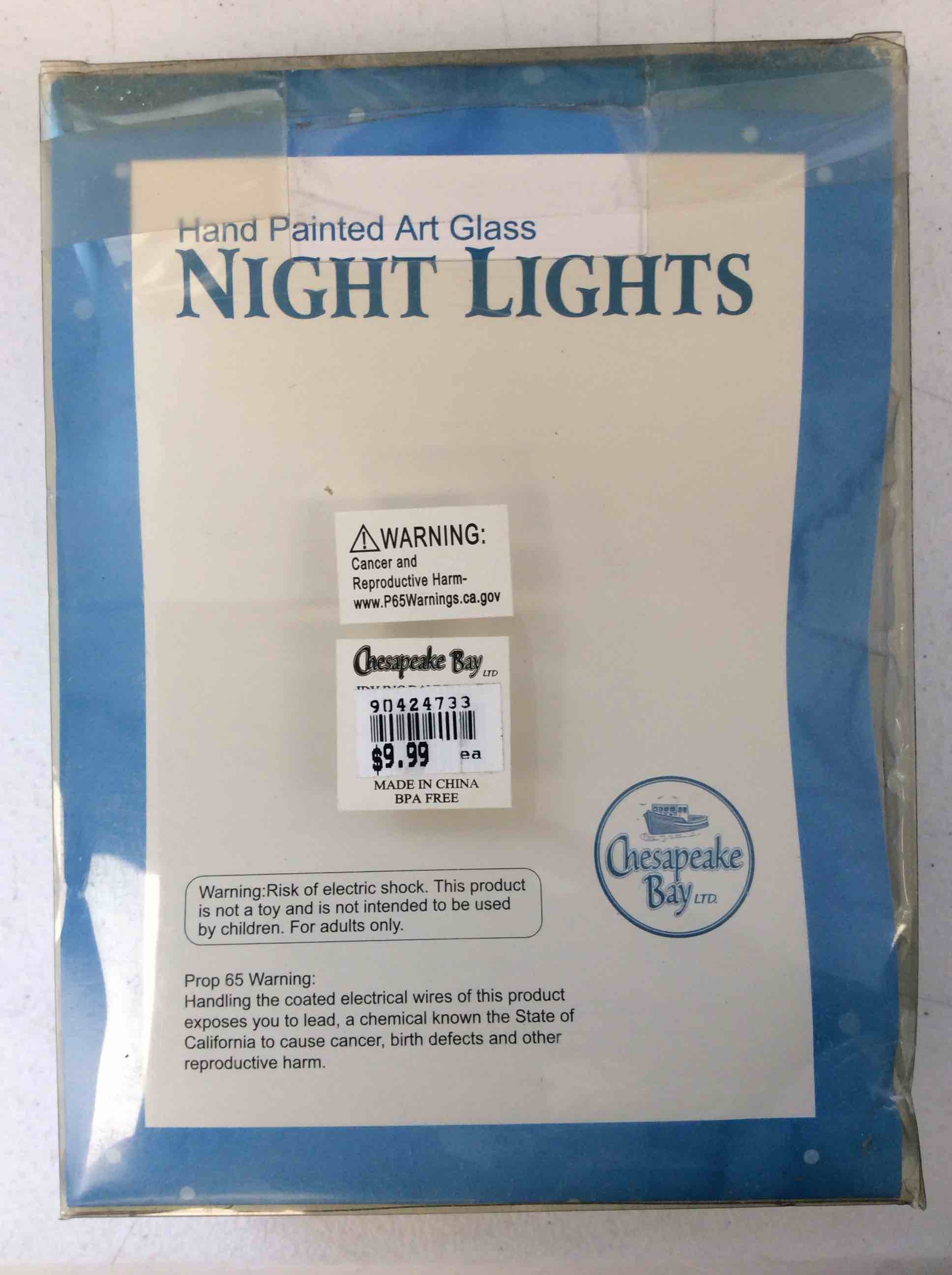 Condition photo showing New/Like New for chesapeake bay hand painted art glass night light sandal
