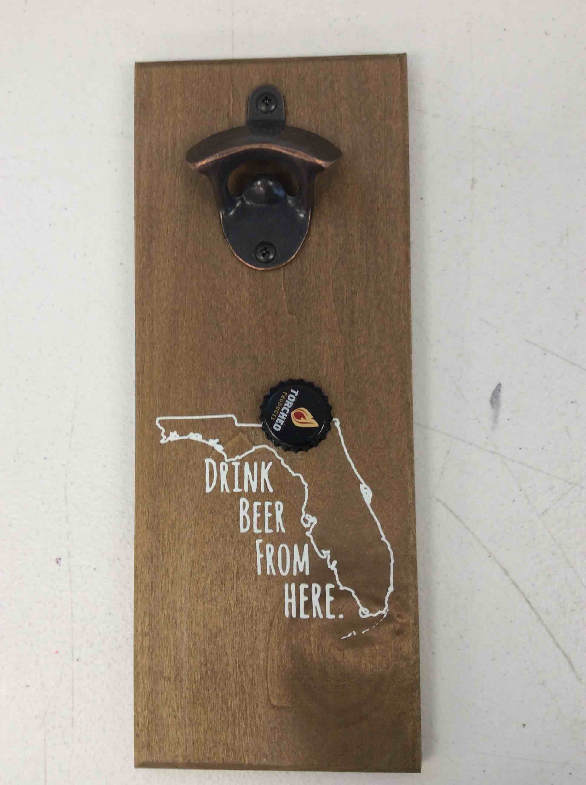 Condition photo showing New/Like New for magnetic bottle opener torched products  drink beer here 