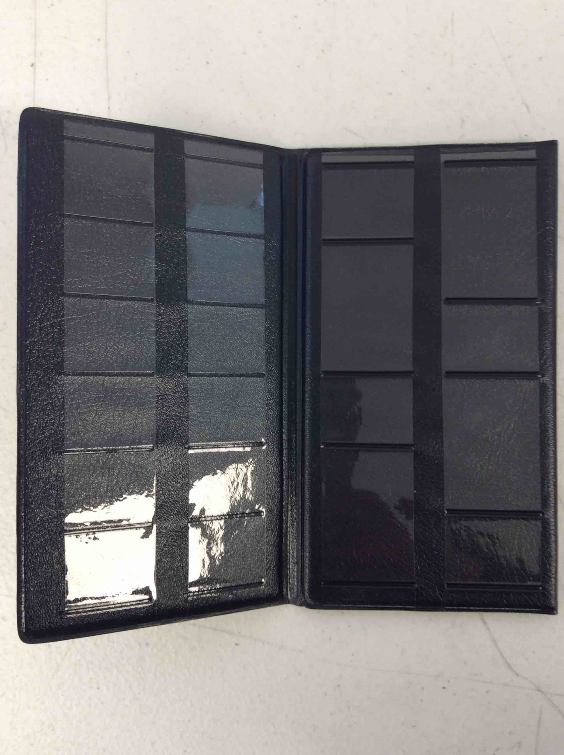 Condition photo showing New/Like New for collectible coin album busch garden 