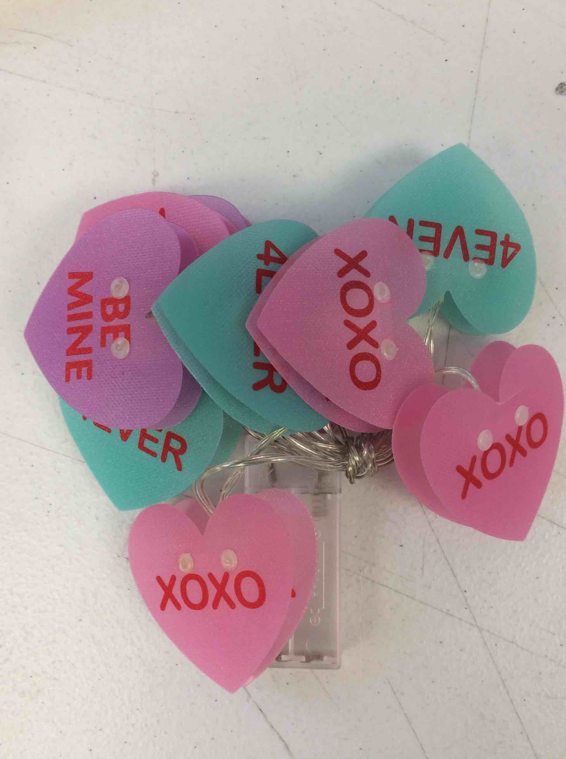 Condition photo showing New/Like New for conversation heart string lights