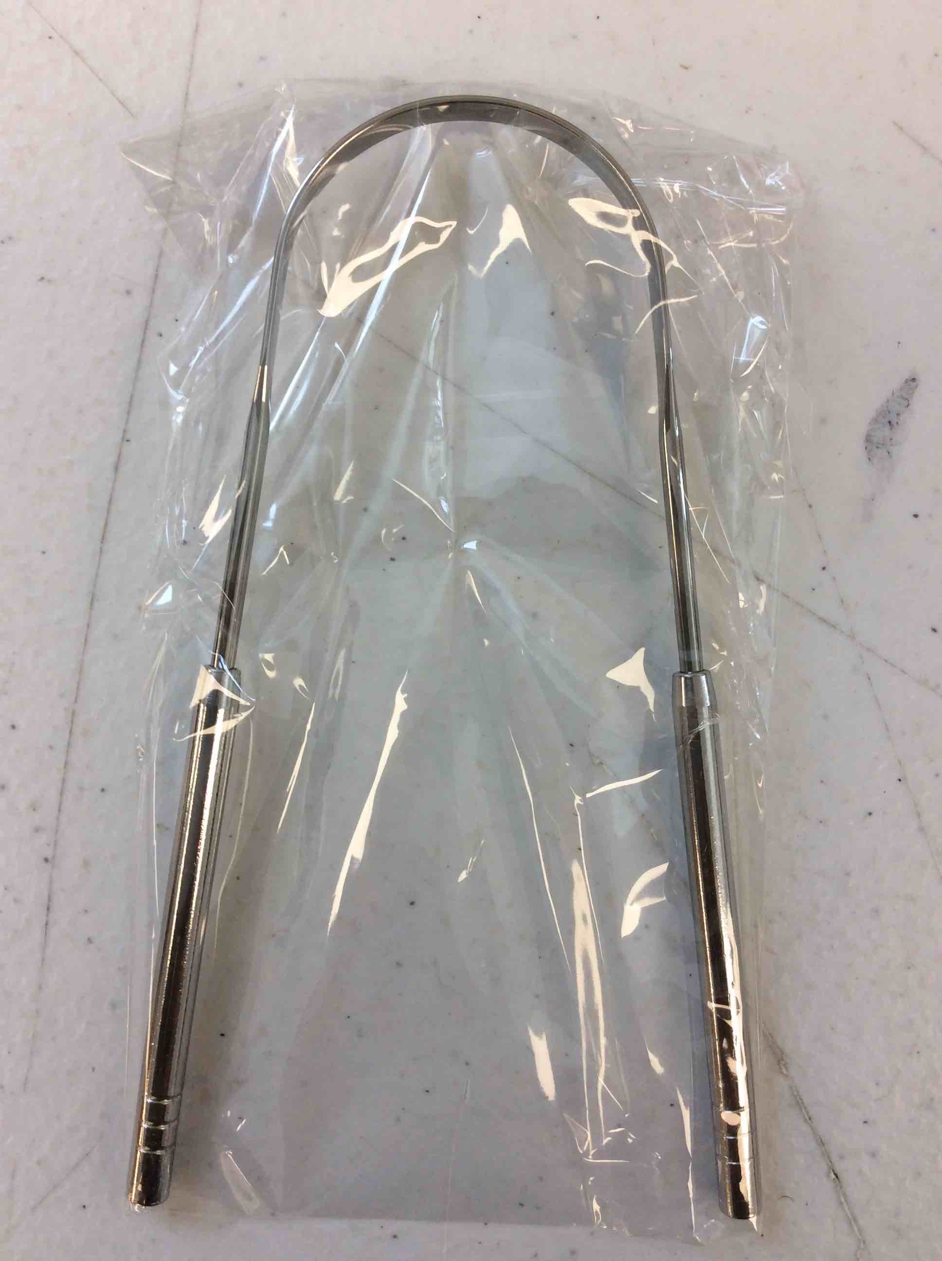 Condition photo showing New/Like New for tongue scraper