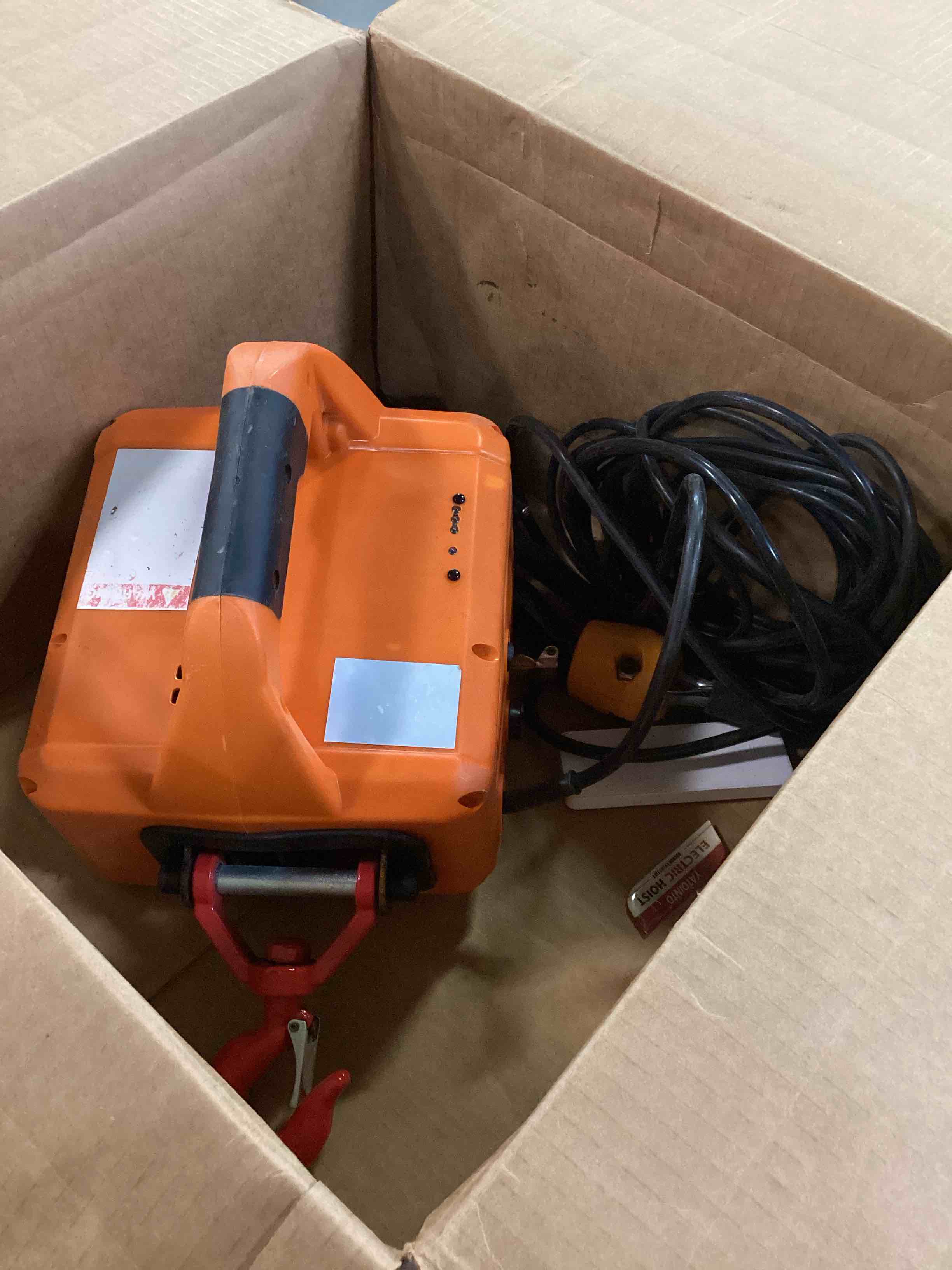 Condition photo showing As Is for yatointo 3-in-1 electric hoist winch, 1540 lbs lift capacity, portable 120v power crane with wired & wireless remote, 25 ft lifting height, overload protection for towing & lifting 1540lb - 3 in 1 orange