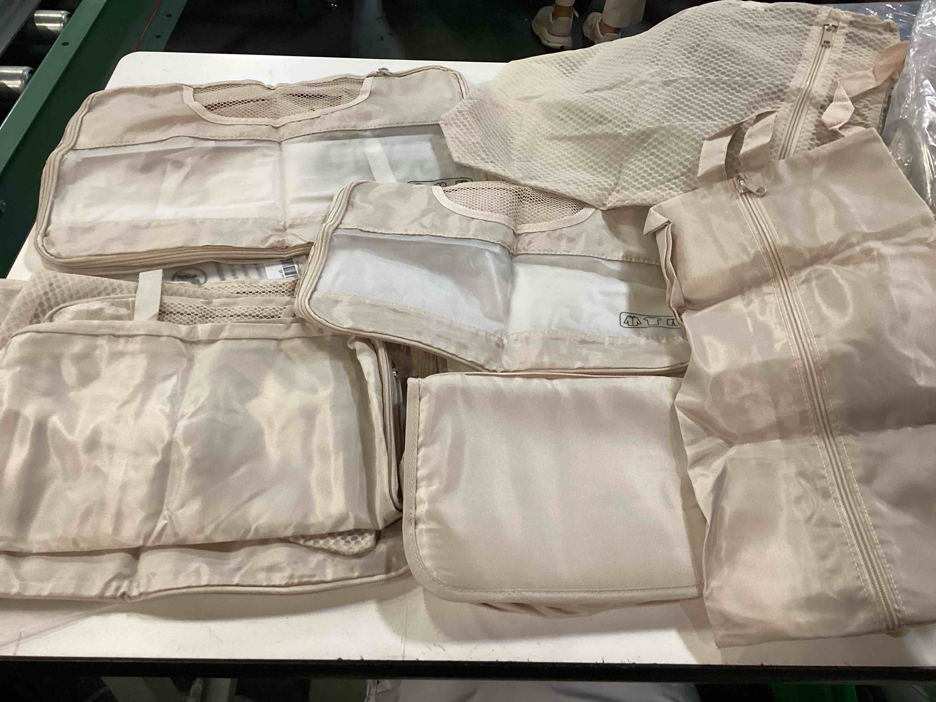 Condition photo showing Good Condition for 8-piece lightweight travel packing cubes, luggage beige