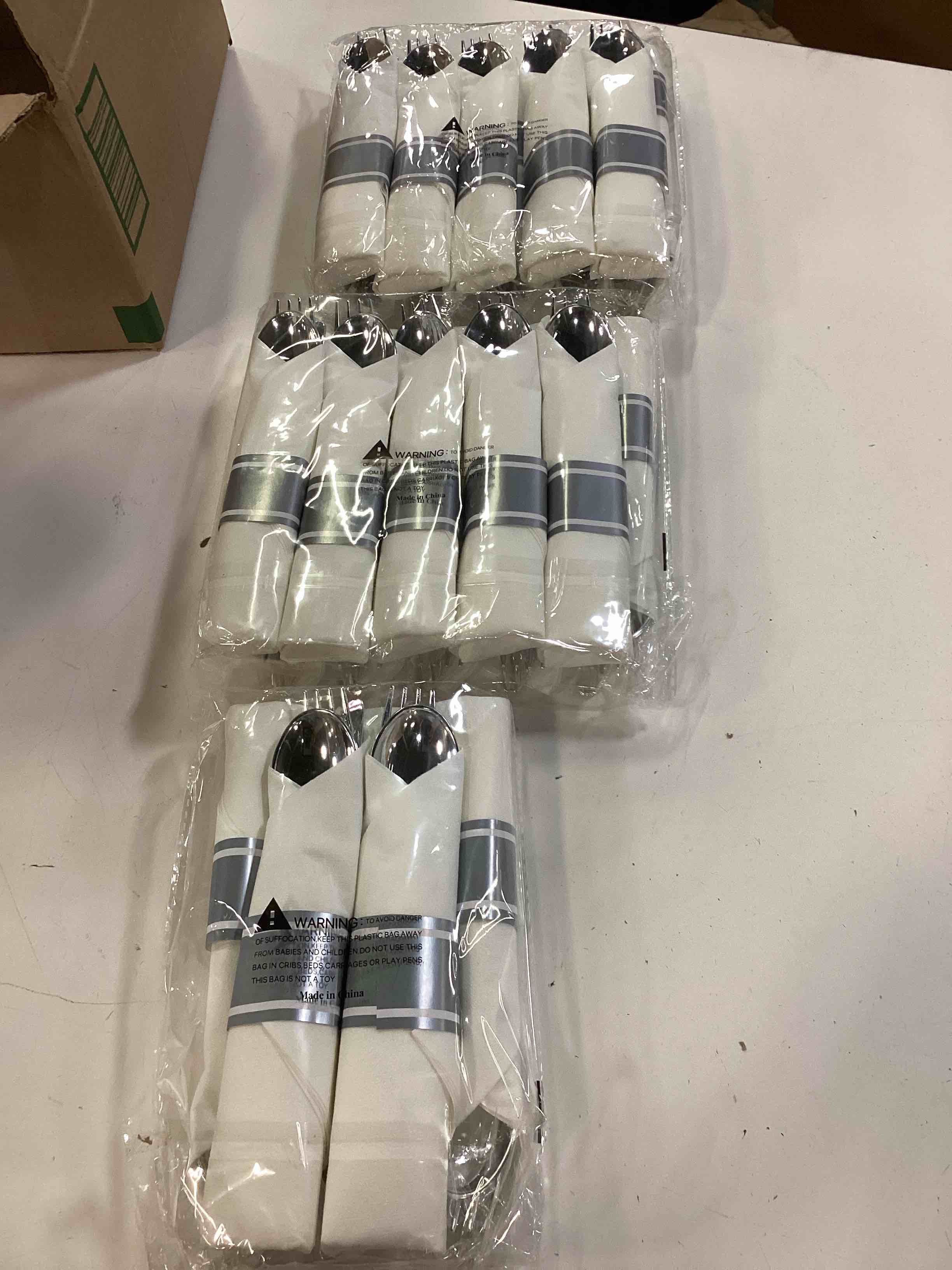 Condition photo showing Good Condition for 25 pack pre rolled silver plastic silverware, wrapped cutlery set include forks, spoons, knives & napkins, disposable heavy duty silverware set for party and wedding