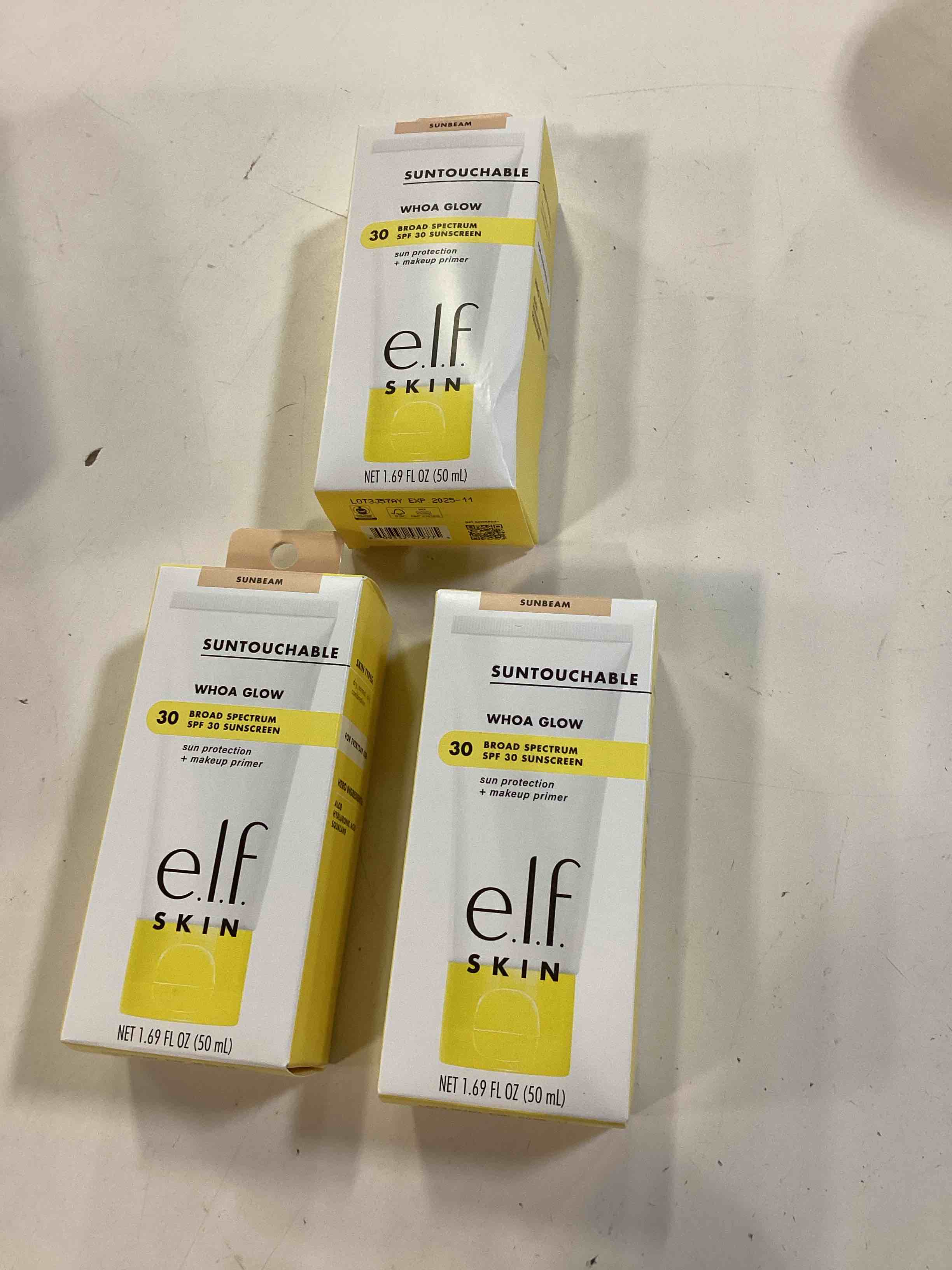 Condition photo showing New/Like New for lot of 3 e.l.f. skin suntouchable whoa glow spf 30, sunscreen & makeup primer for a glowy finish, made with hyaluronic acid, vegan & cruelty-free, packaging may vary, sunbeam