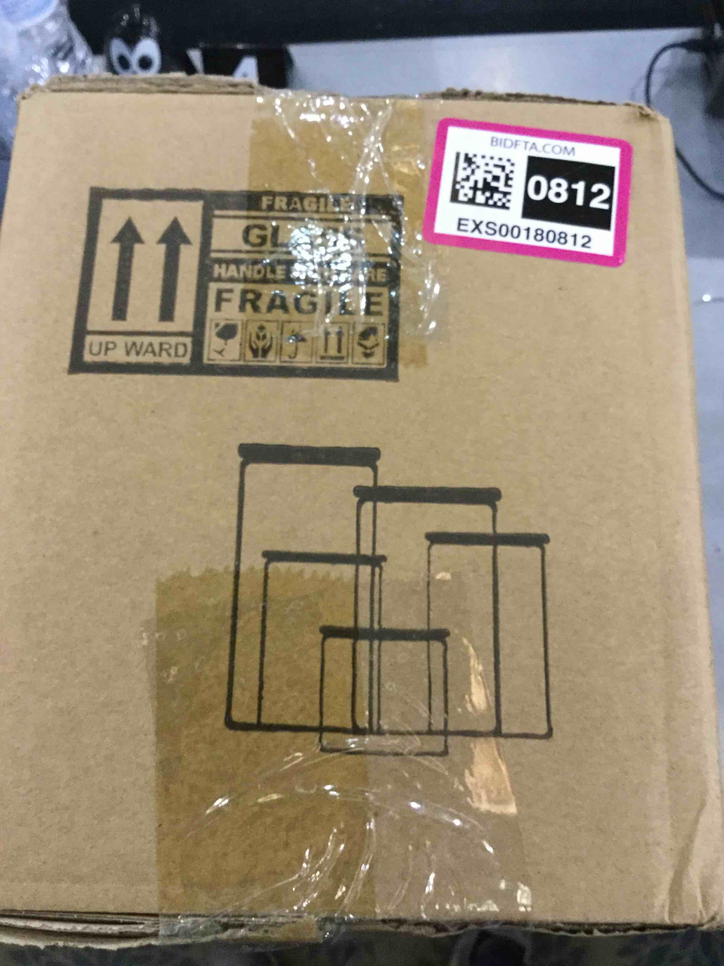 https://s3.amazonaws.com/lotting-images-prod/bidfta/EXS00180812_1684414285436.jpeg