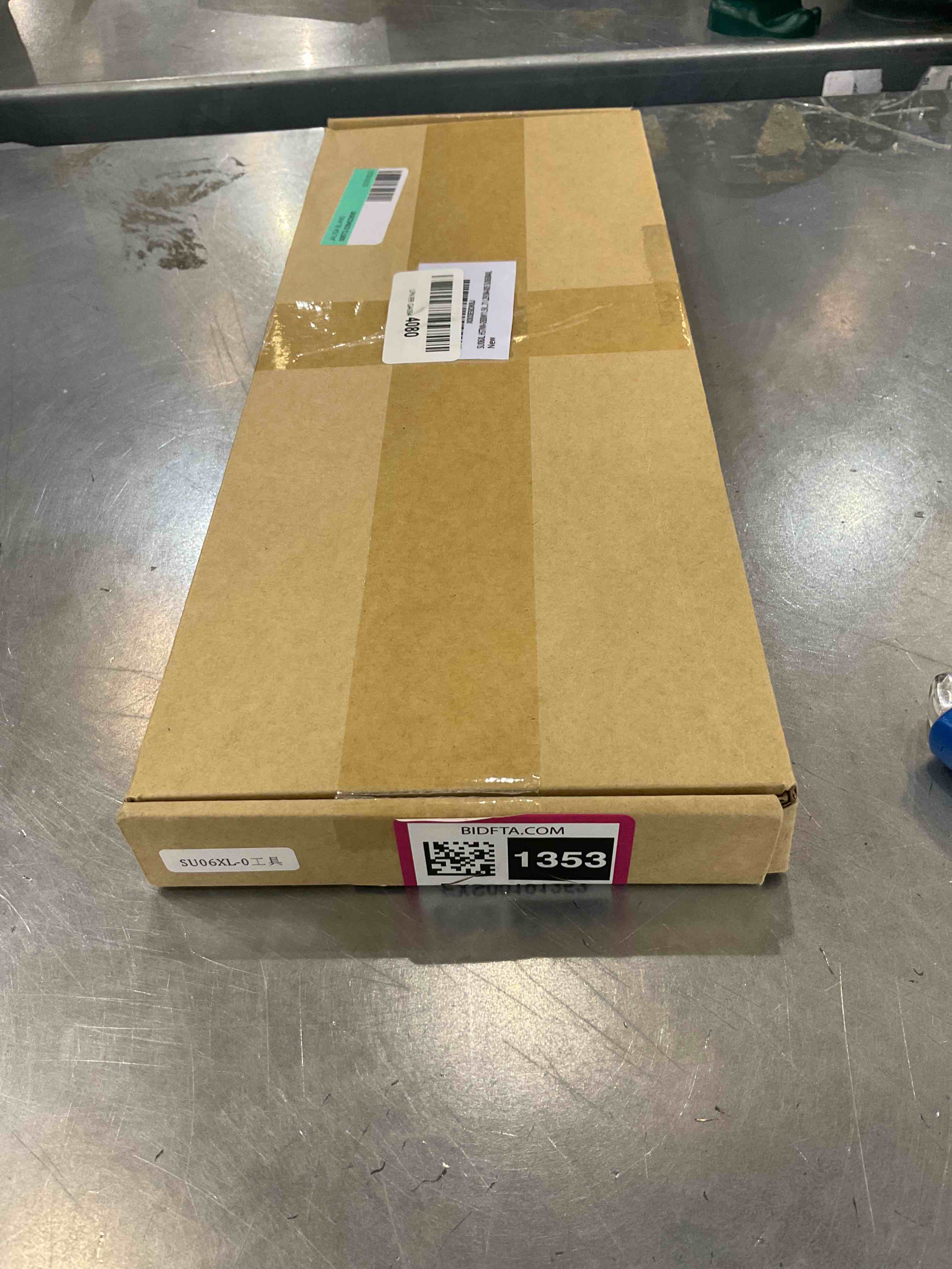 https://s3.amazonaws.com/lotting-images-prod/bidfta/EXS00191353_1683123489394.jpeg