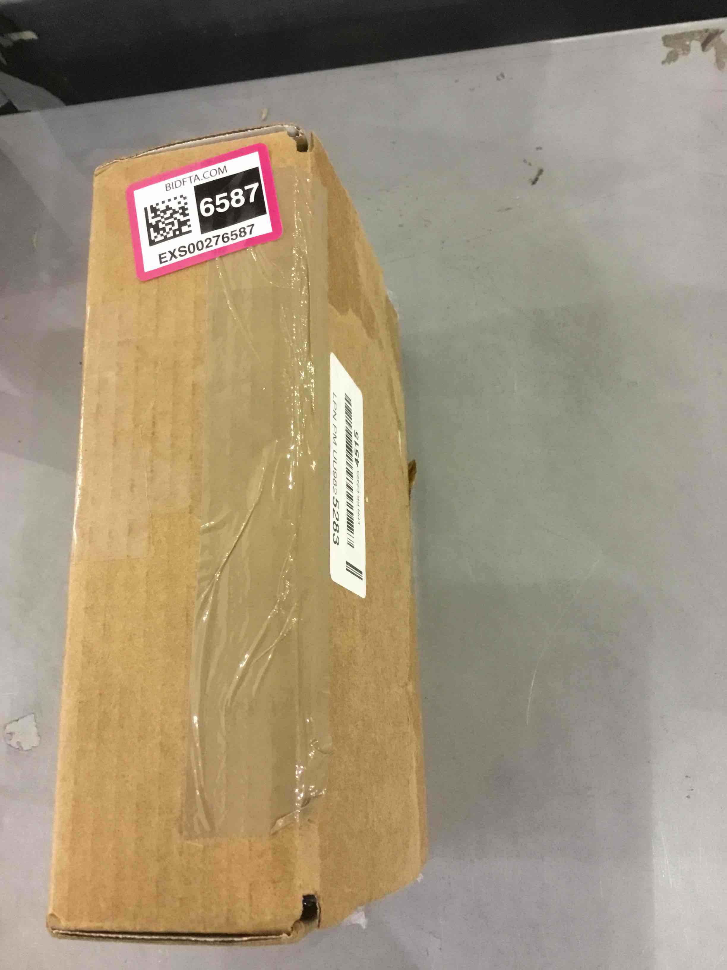 https://s3.amazonaws.com/lotting-images-prod/bidfta/EXS00276587_1685446396427.jpeg