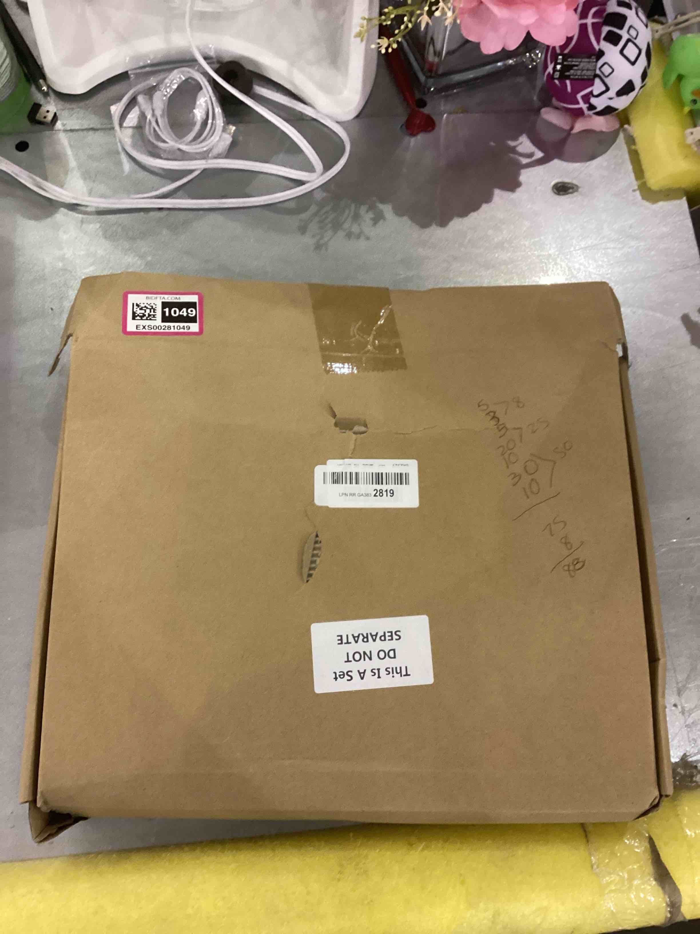 https://s3.amazonaws.com/lotting-images-prod/bidfta/EXS00281049_1687264379508.jpeg