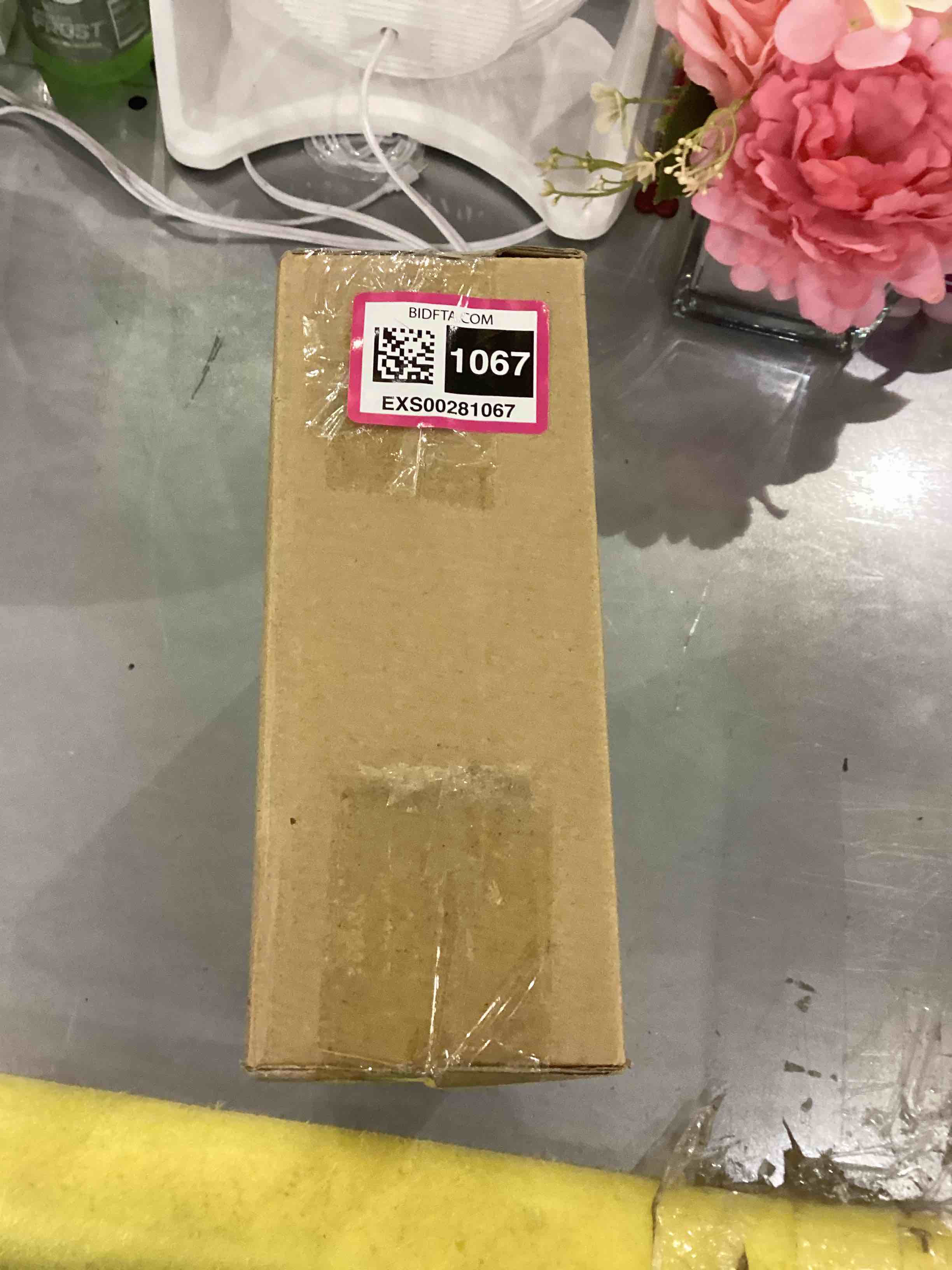 https://s3.amazonaws.com/lotting-images-prod/bidfta/EXS00281067_1687267247398.jpeg
