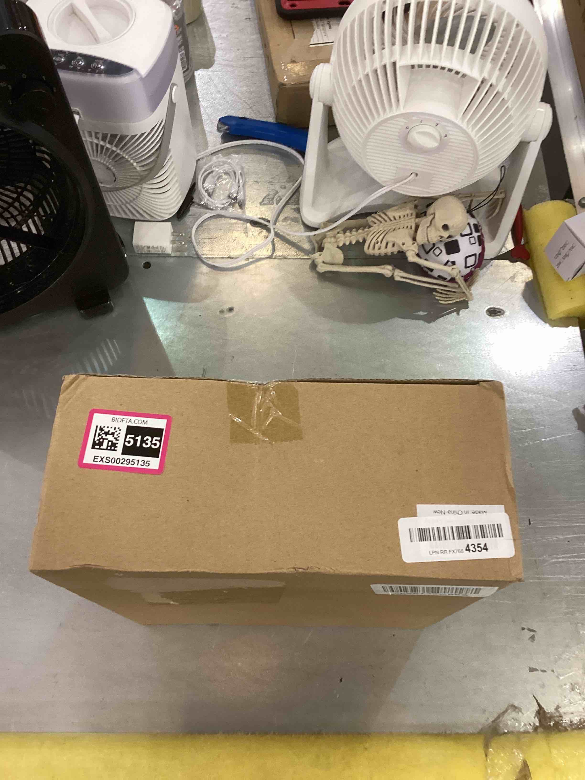 https://s3.amazonaws.com/lotting-images-prod/bidfta/EXS00295135_1686668530860.jpeg