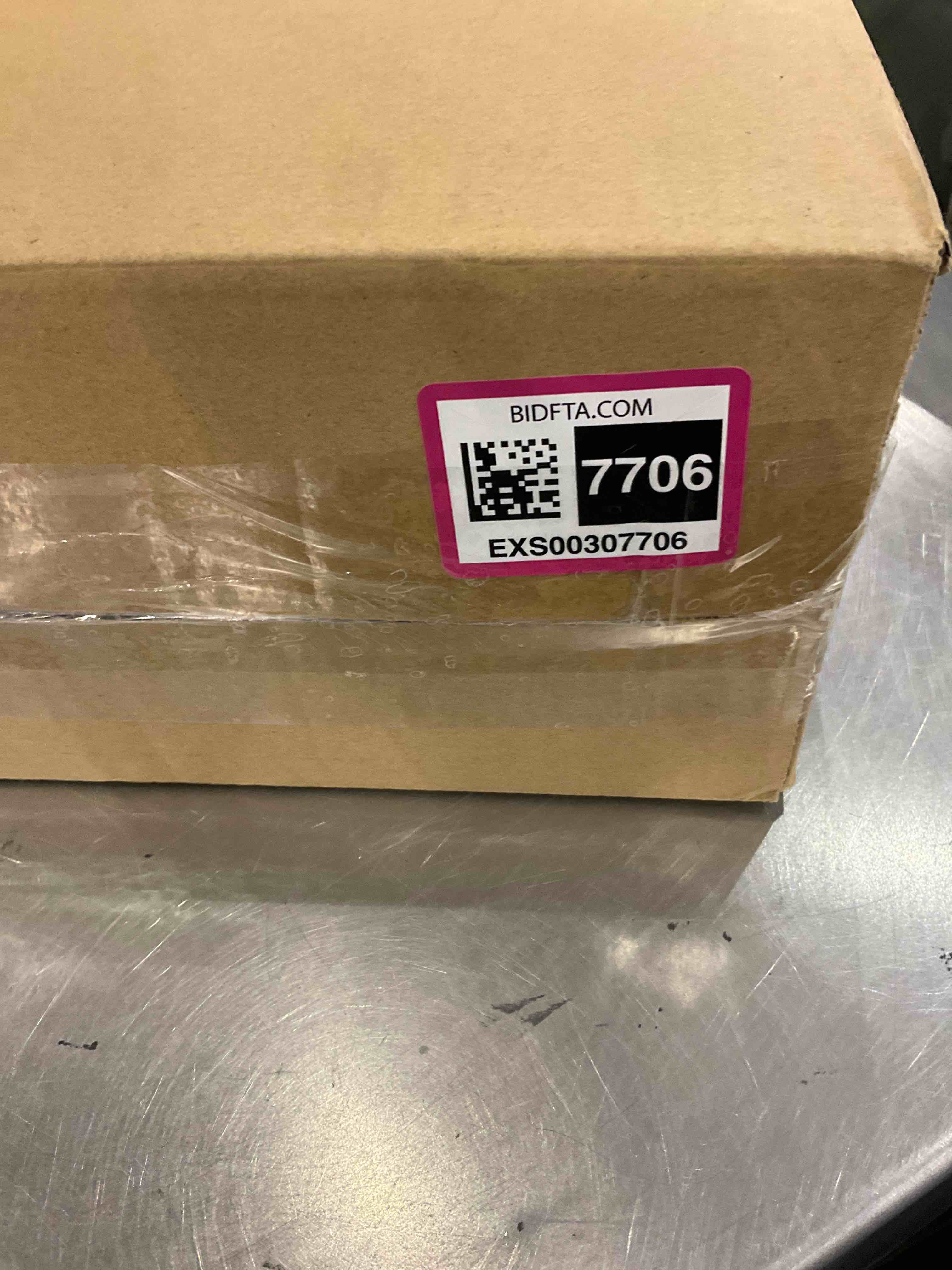 https://s3.amazonaws.com/lotting-images-prod/bidfta/EXS00307706_1689075378457.jpeg