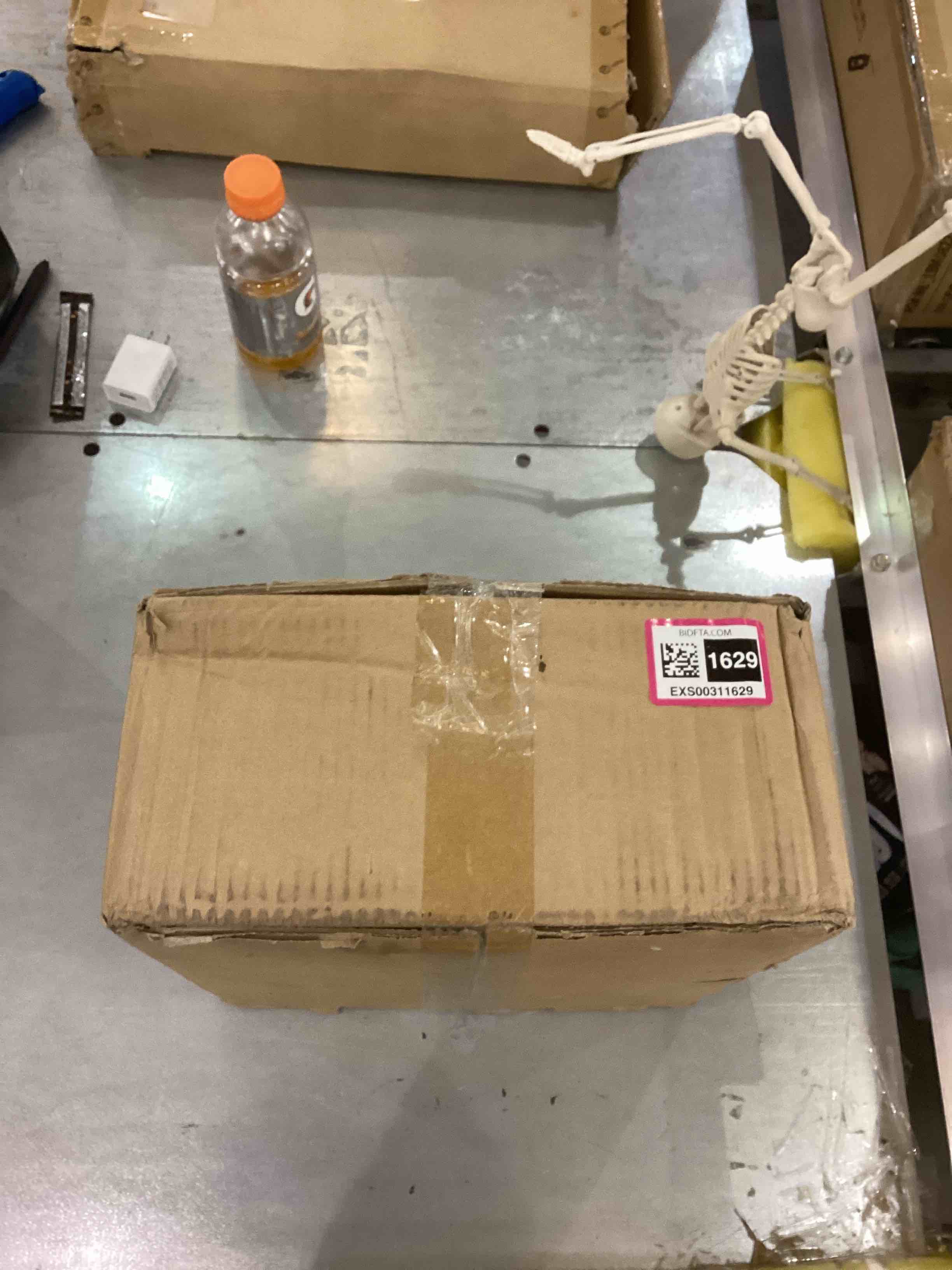 https://s3.amazonaws.com/lotting-images-prod/bidfta/EXS00311629_1688132388484.jpeg
