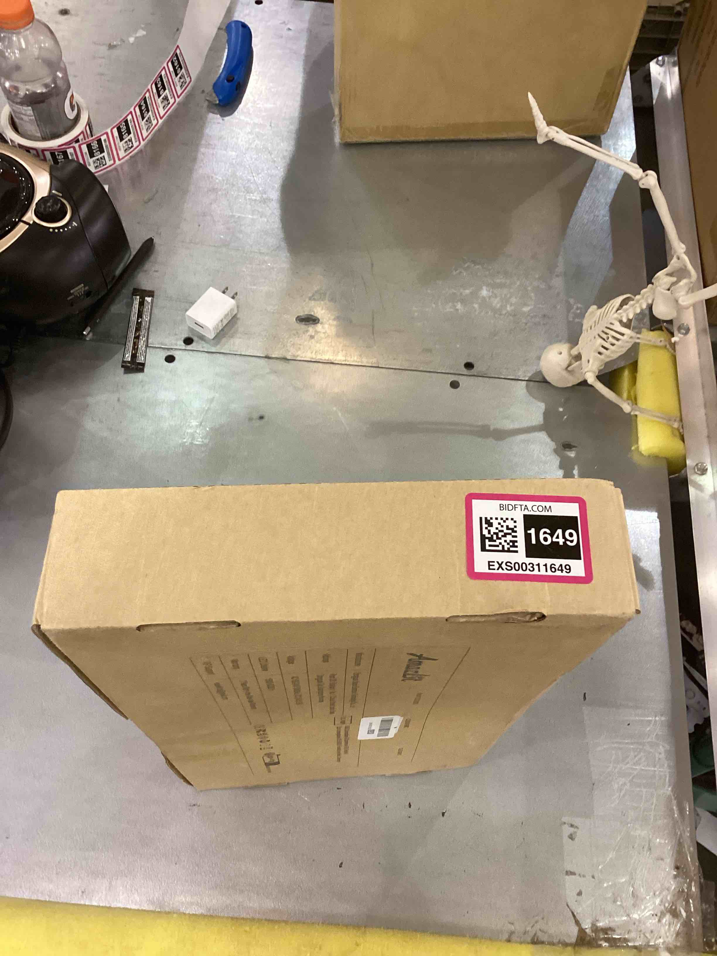 https://s3.amazonaws.com/lotting-images-prod/bidfta/EXS00311649_1688134220888.jpeg