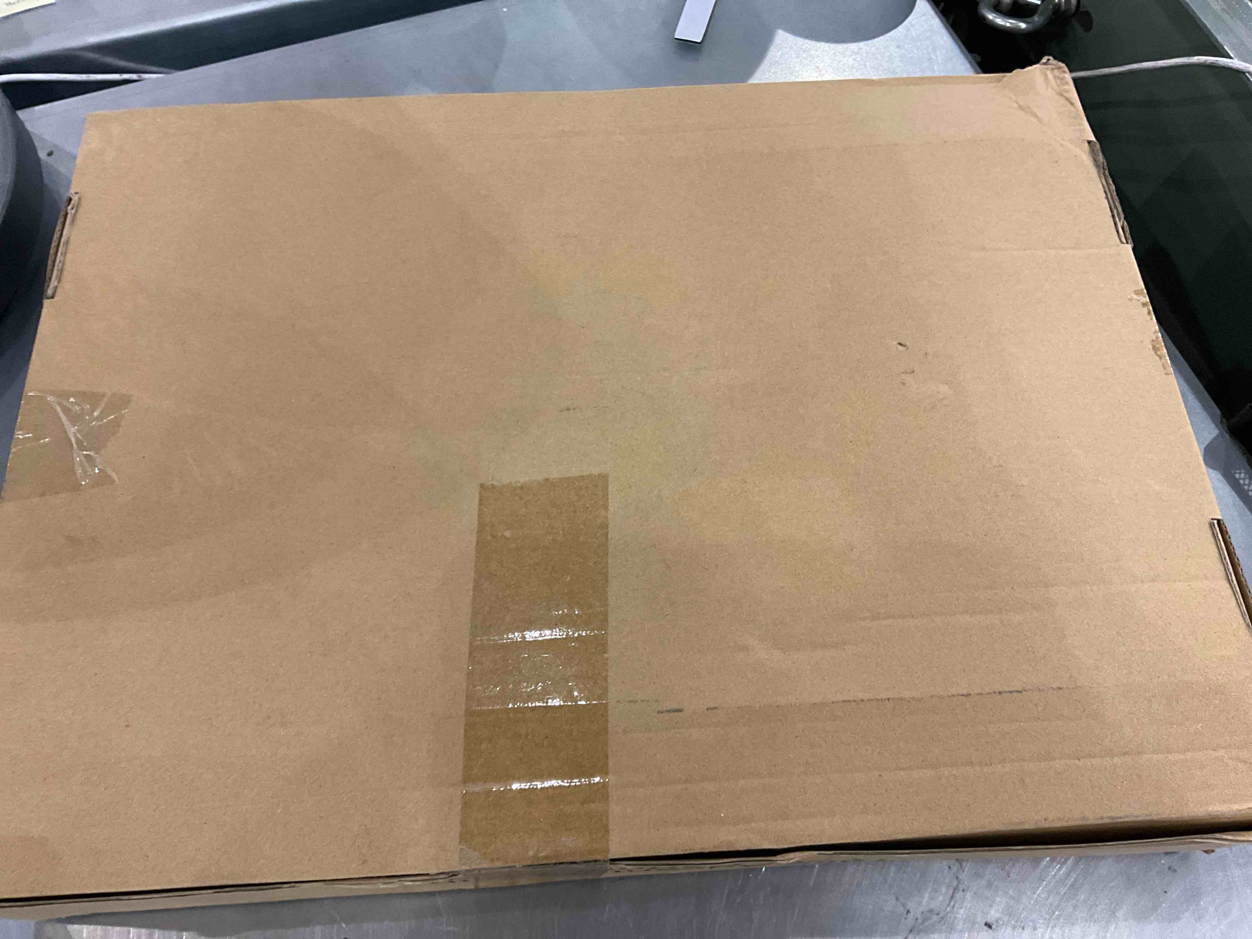 https://s3.amazonaws.com/lotting-images-prod/bidfta/EXS00313533_1688124816400.jpeg