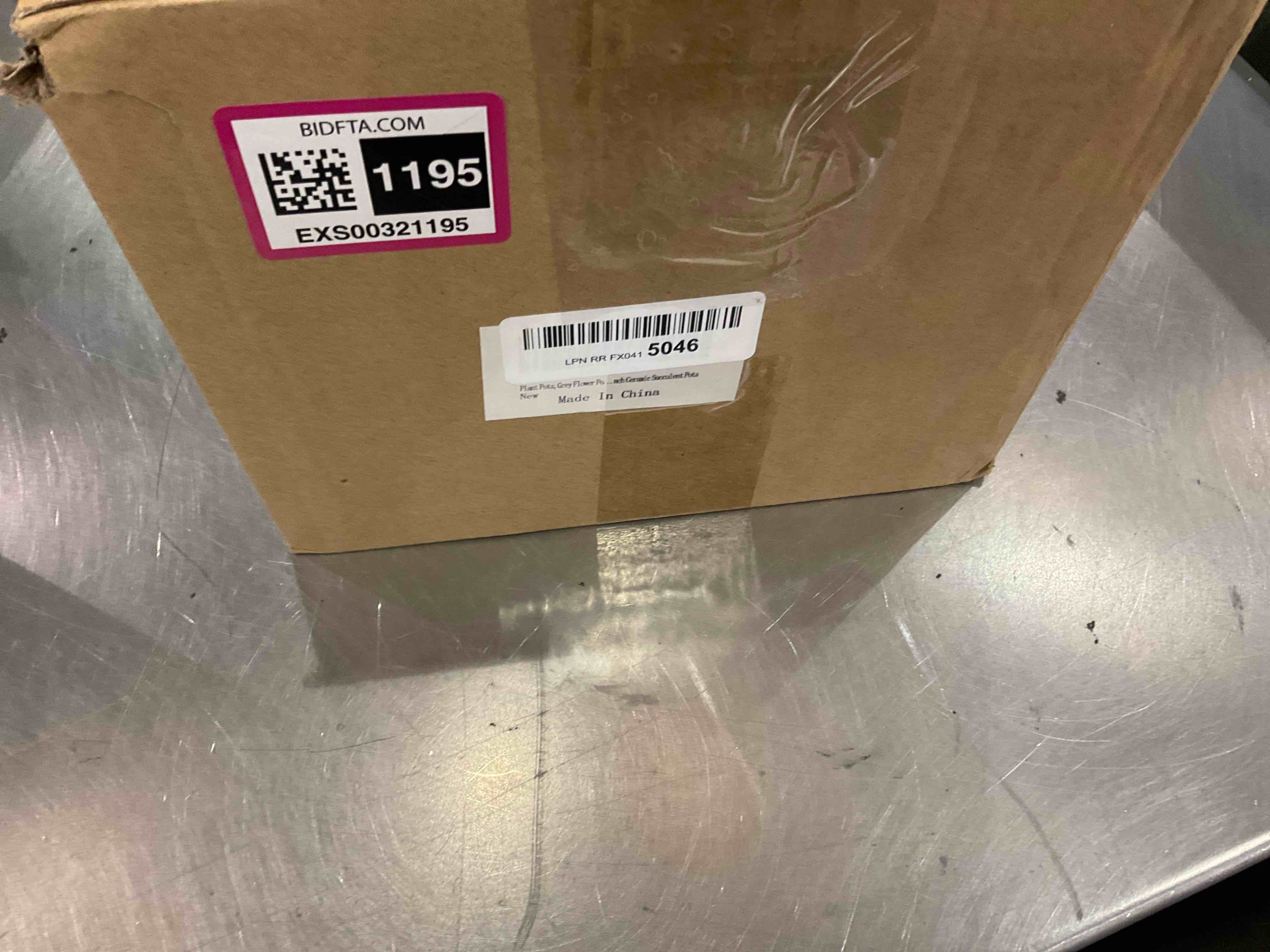 https://s3.amazonaws.com/lotting-images-prod/bidfta/EXS00321195_1689263140104.jpeg