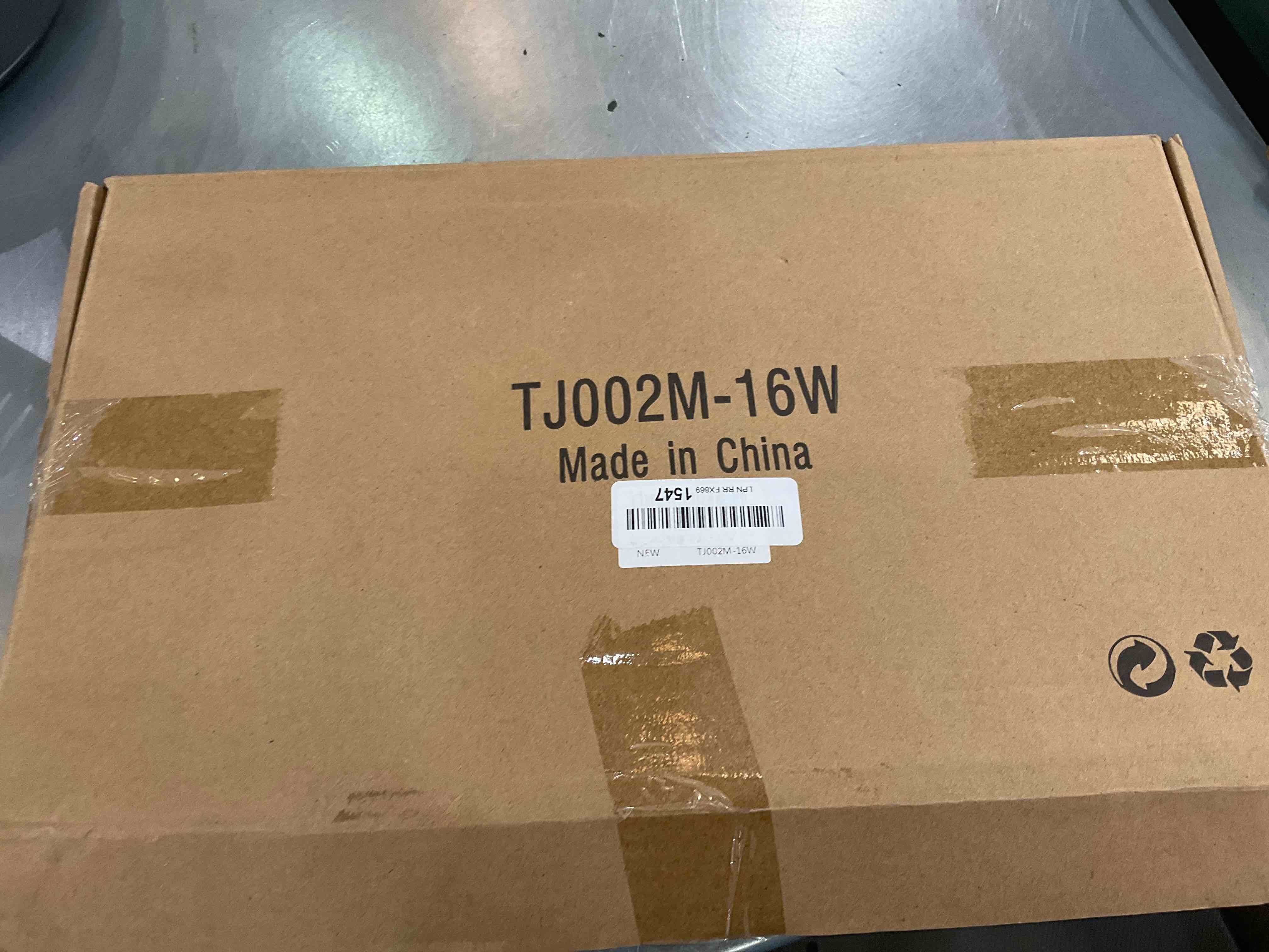 https://s3.amazonaws.com/lotting-images-prod/bidfta/EXS00327943_1689101924405.jpeg