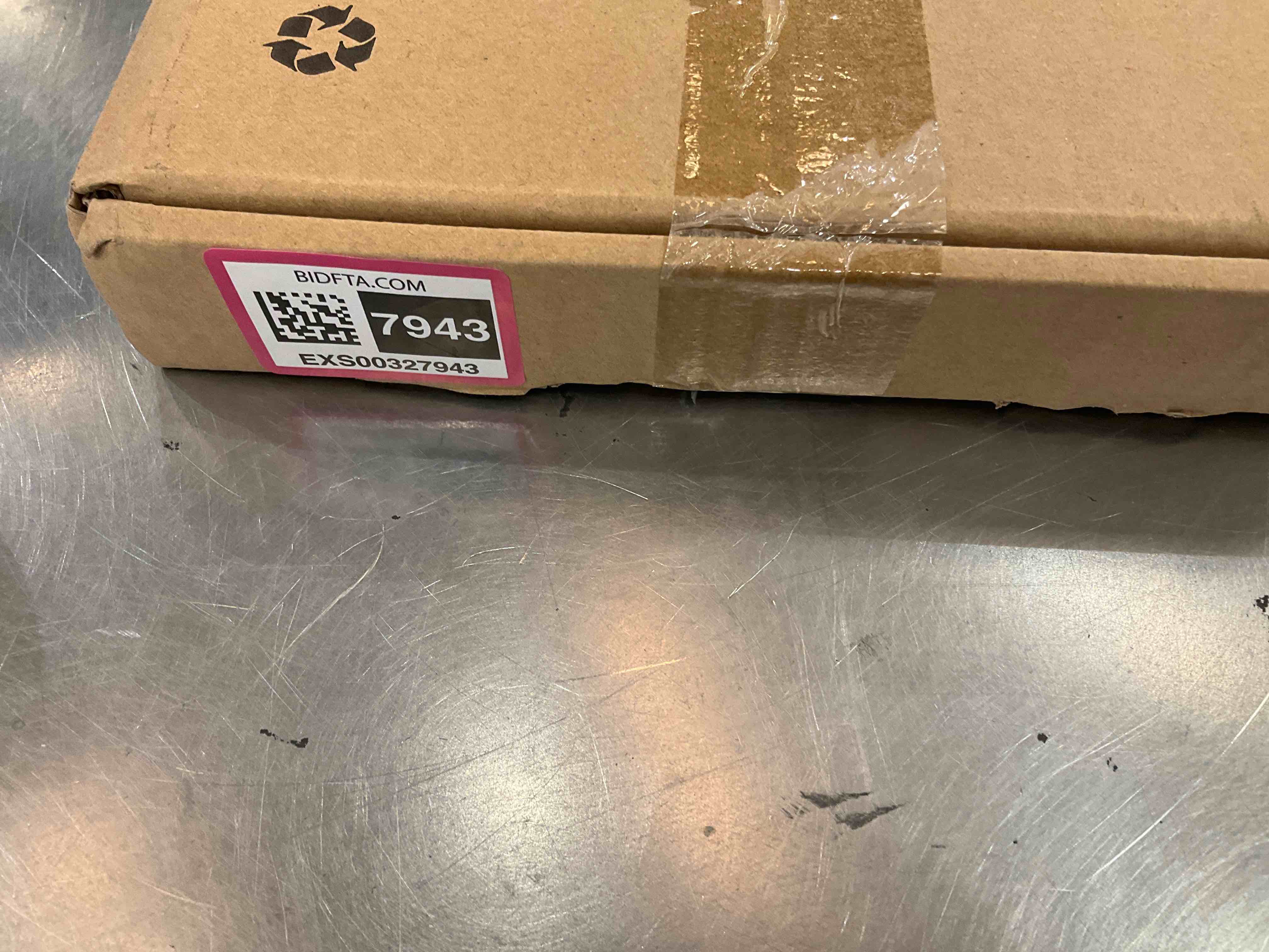 https://s3.amazonaws.com/lotting-images-prod/bidfta/EXS00327943_1689101957353.jpeg